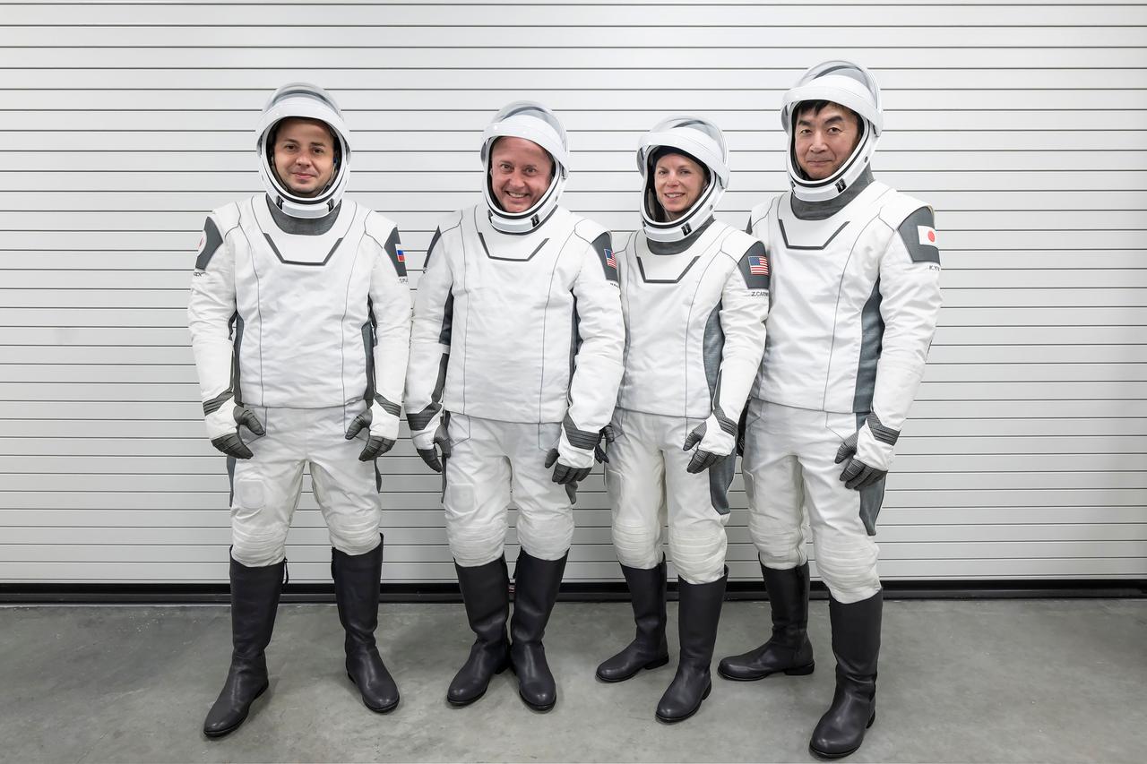 jsc2025e064549 (July 3, 2025) --- The crew of NASA’s SpaceX Crew-11 mission pose for a photo during a training session for their upcoming trip to the International Space Station at SpaceX facilities in Florida. From left: Oleg Platonov, Mike Fincke, Zena Cardman, and Kimiya Yui. Credit: SpaceX