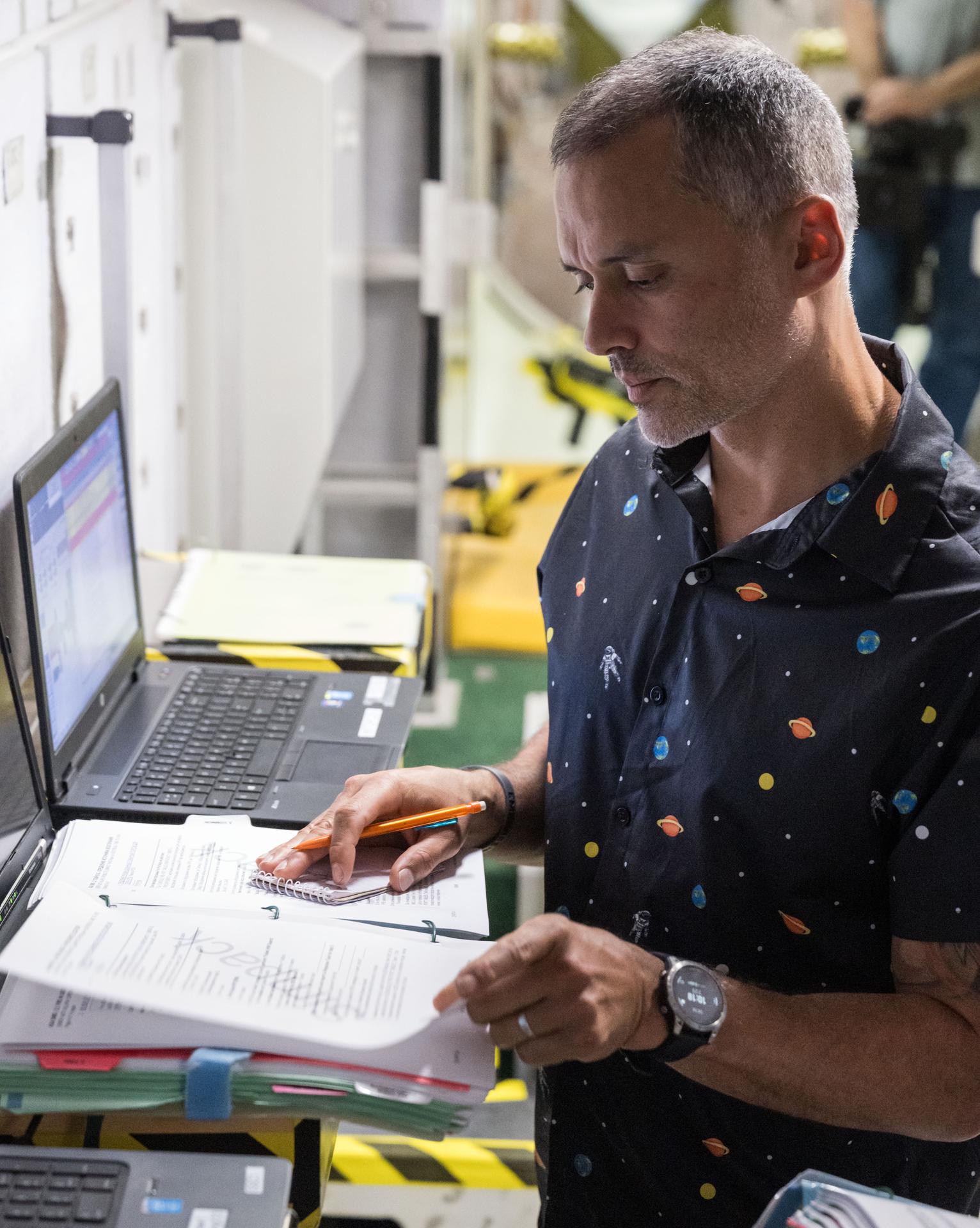 NASA astronaut and Expedition 75 flight engineer Anil Menon participates in a training session at Johnson Space Center's Space Vehicle Mockup Facility in Houston, Texas, ahead of his upcoming mission to the International Space Station.