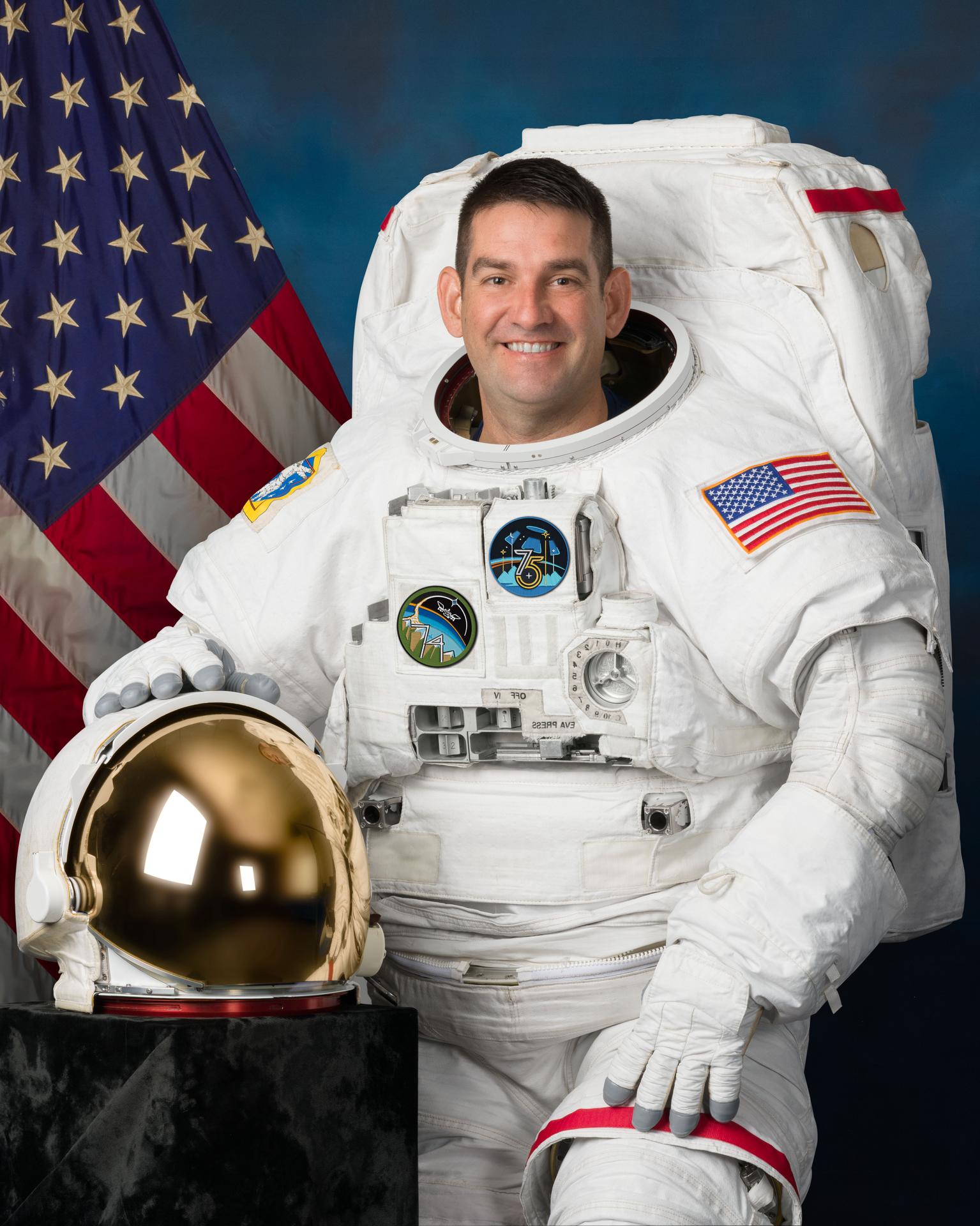 Official portrait of NASA astronaut Jack Hathaway wearing a spacesuit, also called an Extravehicular Mobility Unit (EMU), at NASA's Johnson Space Center in Houston, Texas.