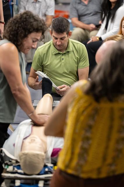 NASA image: NASA astronaut Jessica Meir and Jack Hathaway practice cardiopulmonary resuscitation (CPR)