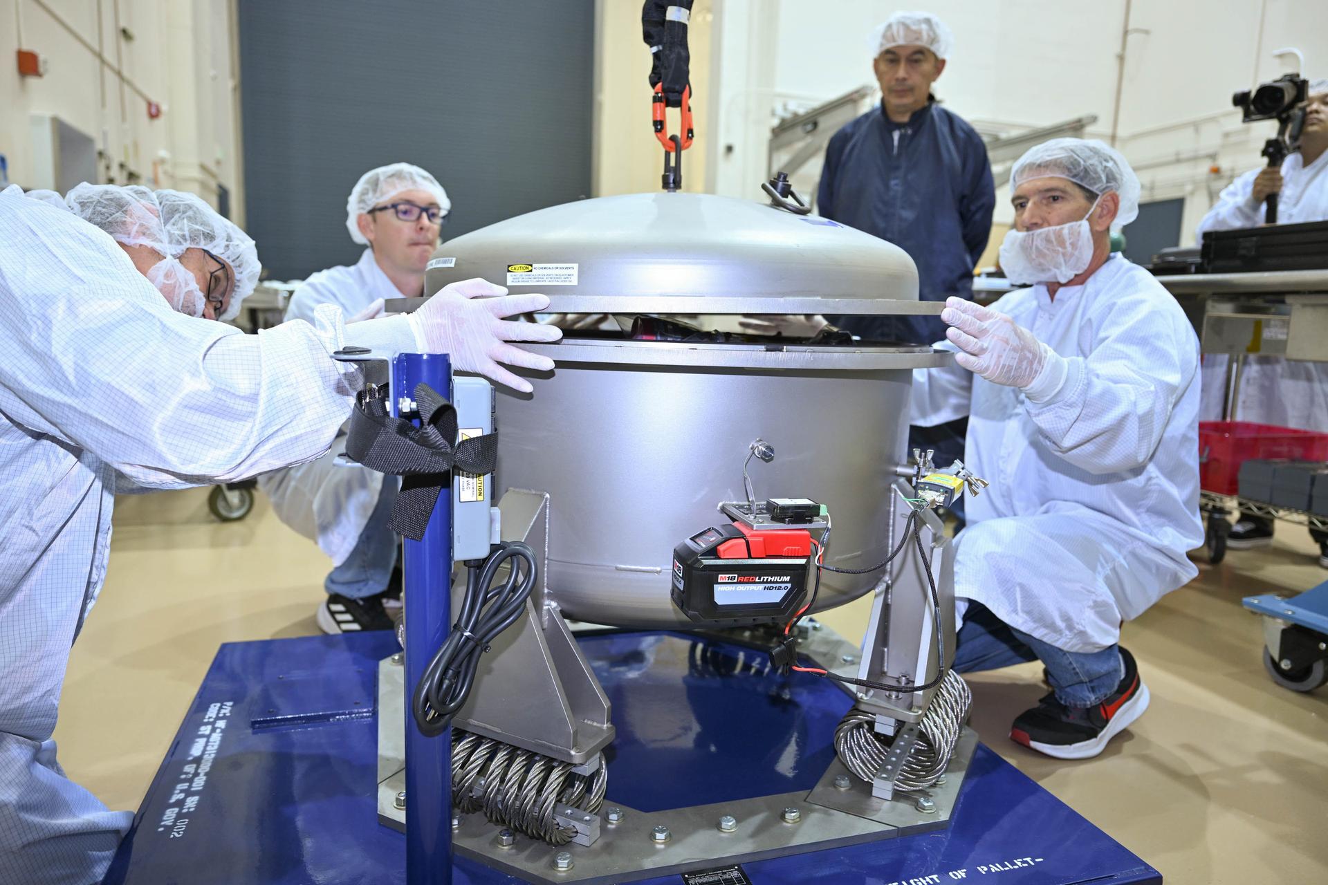 Technicians at Lanteris Space Systems in Palo Alto, California, remove the first of three Advanced Electric Propulsion System (AEPS) flight thrusters from its transport container following delivery from NASA’s Glenn Research Center. The thruster previously completed acceptance testing at Glenn and will be prepared for integration with Gateway’s Power and Propulsion Element (PPE). Credit: Lanteris Space Systems
