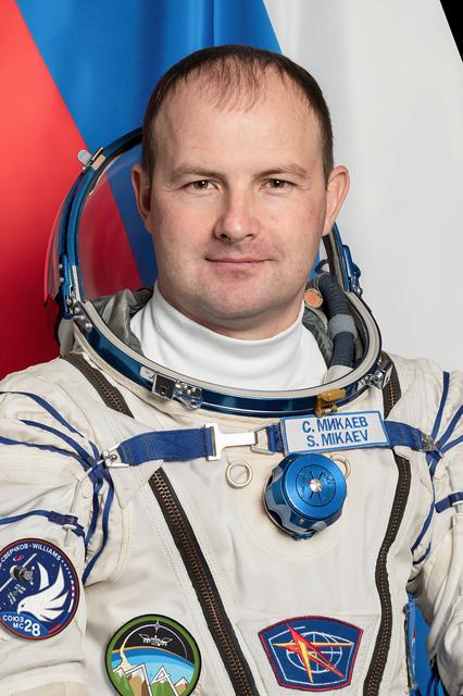 NASA image: Roscosmos cosmonaut Sergey MIkaev poses for a portrait at the Gagarin Cosmonaut Training Center