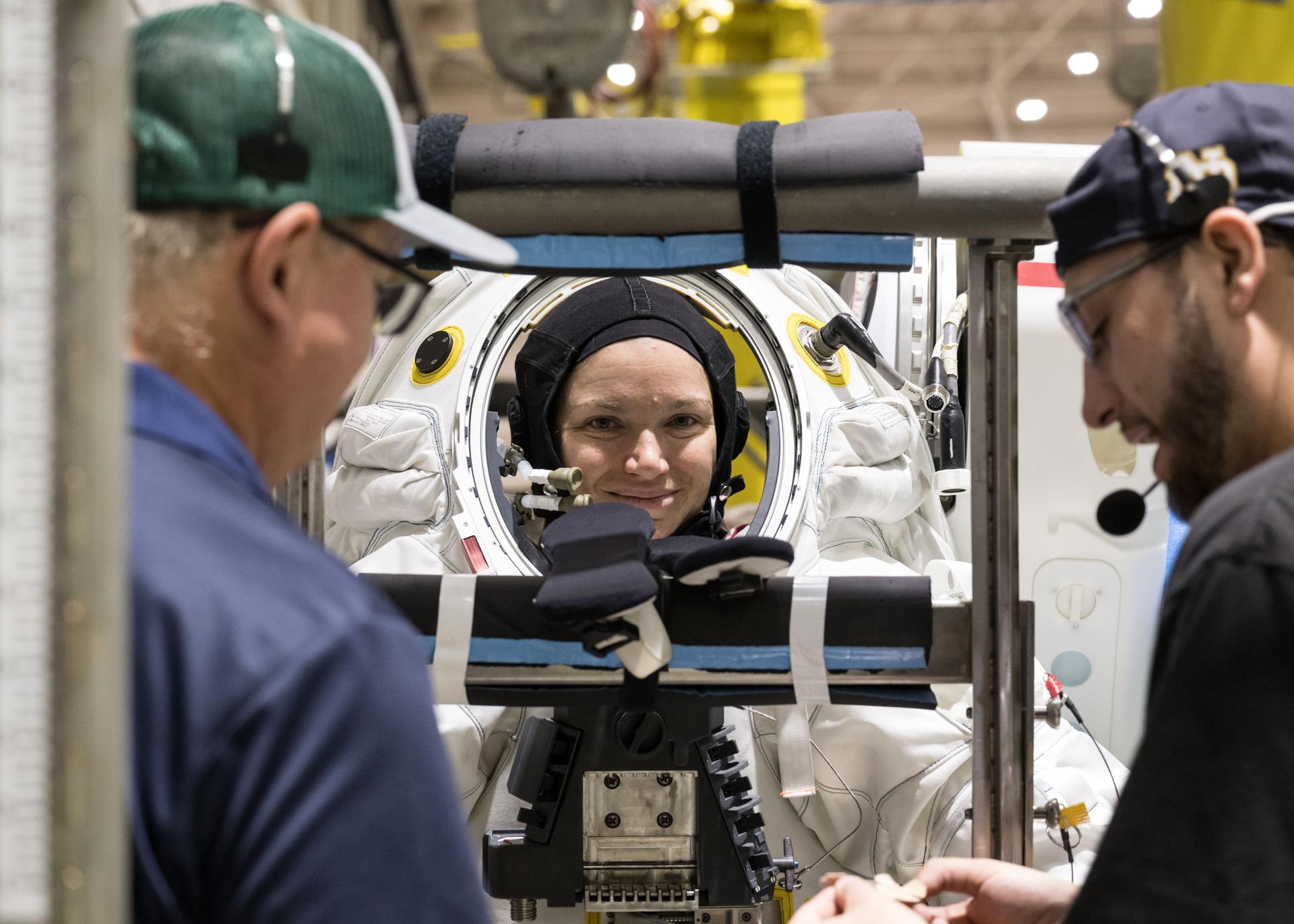 Canadian Space Agency astronaut Jenni Gibbons gets suited up in Axiom Space’s lunar spacesuit at NASA’s Neutral Buoyancy Laboratory in Houston. During a recent test series, NASA engineers and crewmembers wore the lunar spacesuit under water and conducted numerous tasks during simulated lunar operations to test its mobility and functionality and ensure the spacesuit is prepped and ready for Artemis training.