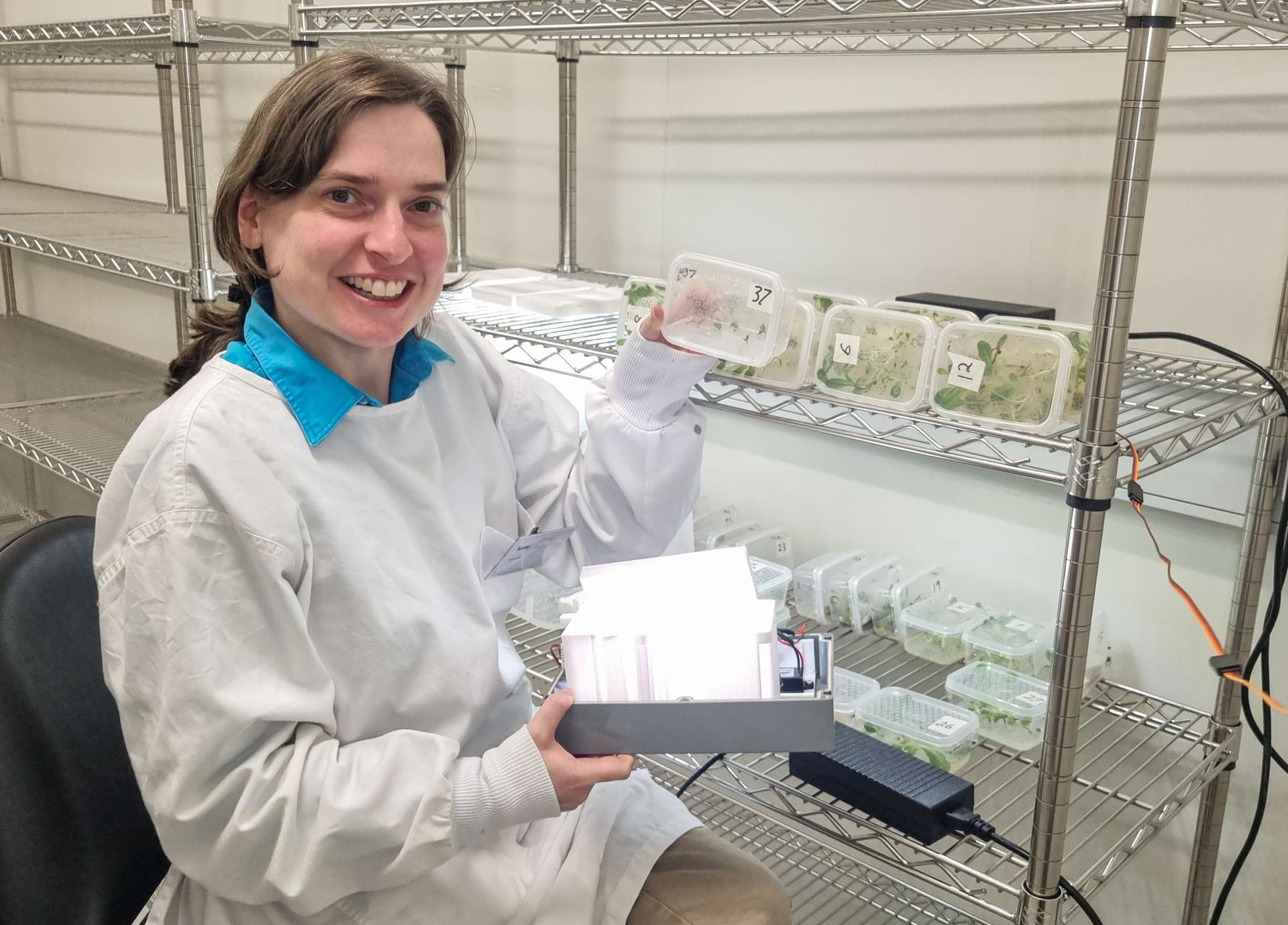 Project Rapunzel principal investigator testing the plant chambers on the ground. This investigation tests a special plant chamber and uses computer vision to monitor plant health. Investigation findings may inform ways to automatically monitor plant health and reduce plant stress during long-duration space missions. Credit. UniSQ