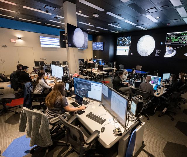jsc2026e000861 --- The Artemis II Lunar Science Team works in the Science Eva...