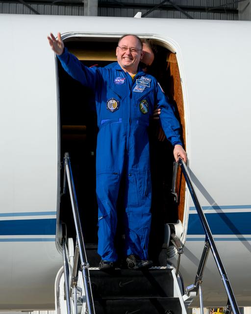 NASA image: NASA astronaut Mike Fincke waves to officials at Ellington Field in Houston, Texas