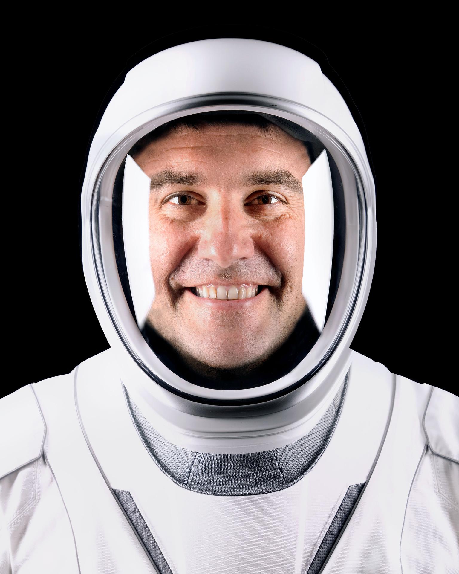 NASA astronaut Jack Hathaway, pilot of NASA’s SpaceX Crew-12 mission to the International Space Station, poses for a portrait in his pressure suit at SpaceX headquarters in Hawthorne, California.