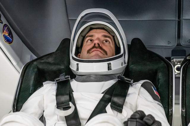NASA image: NASA astronaut Jack Hathaway is photographed  inside the Dragon spacecraft