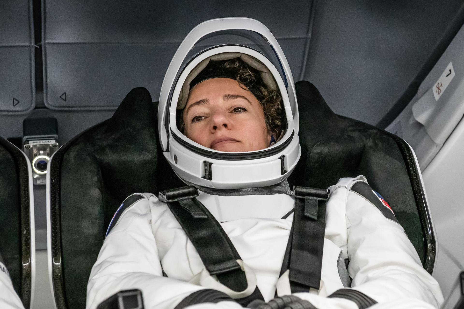 NASA astronaut and SpaceX Crew-12 Commander Jessica Meir is photographed in her pressure suit and inside the Dragon spacecraft during the Crew Equipment Interface Test at NASA’s Kennedy Space Center in Florida. The goal of the training is to rehearse launch day activities and get a close look at the spacecraft that will take them to the International Space Station.