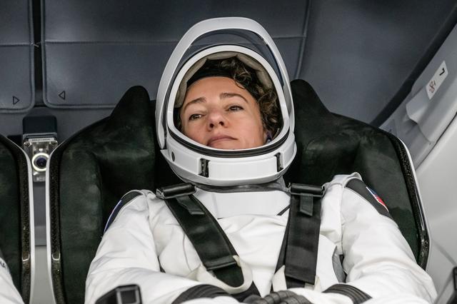 NASA image: NASA astronaut Jessica Meir is photographed inside the Dragon spacecraft 