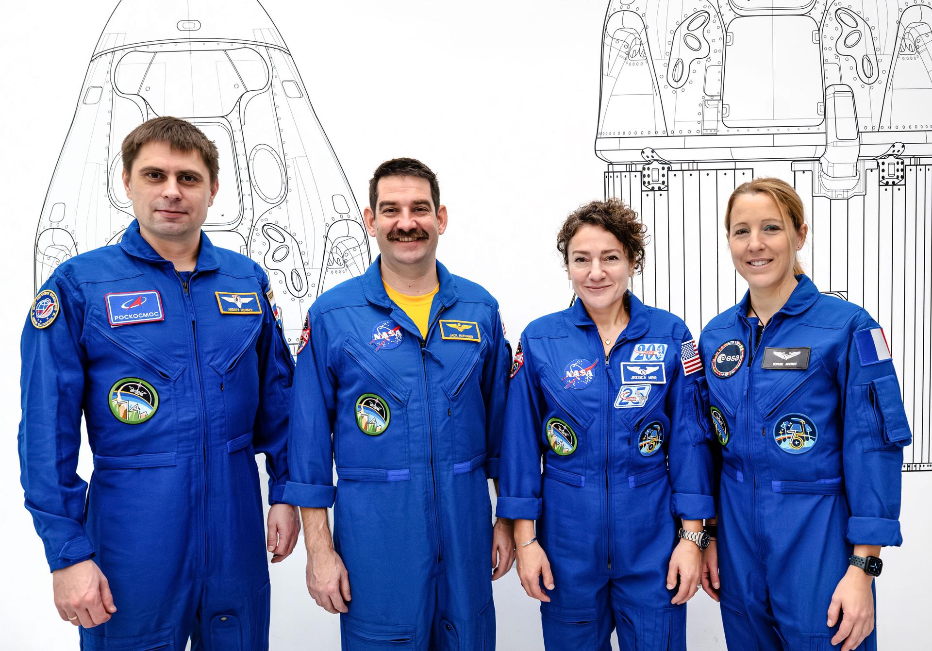 The four members of NASA's SpaceX Crew-12 mission to the International Space Station pose together for a crew portrait in their blue flight suits at SpaceX headquarters in Hawthorne, California. From left are, Roscosmos cosmonaut and Mission Specialist Andrey Fedyaev, NASA astronauts Jack Hathaway and Jessica Meir, Pilot and Commander respectively, and ESA (European Space Agency) astronaut and Mission Specialist Sophie Adenot.