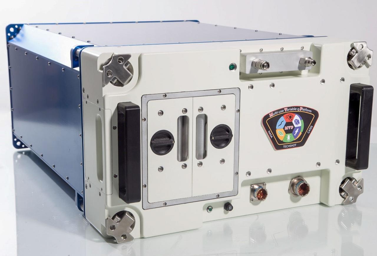 jsc2026e005498 (February 04, 2026) -- The Multi-use Variable-g Platform (MVP) facility is shown which houses up to 12 science modules. Pictured are two installed consumable modules that may be used for minor environmental control, such as desiccation, carbon dioxide control, and ethylene scrubbing. Power and data connectors allow ground control to monitor the health and status of the unit. Credit: Grant Vellinger, Redwire.