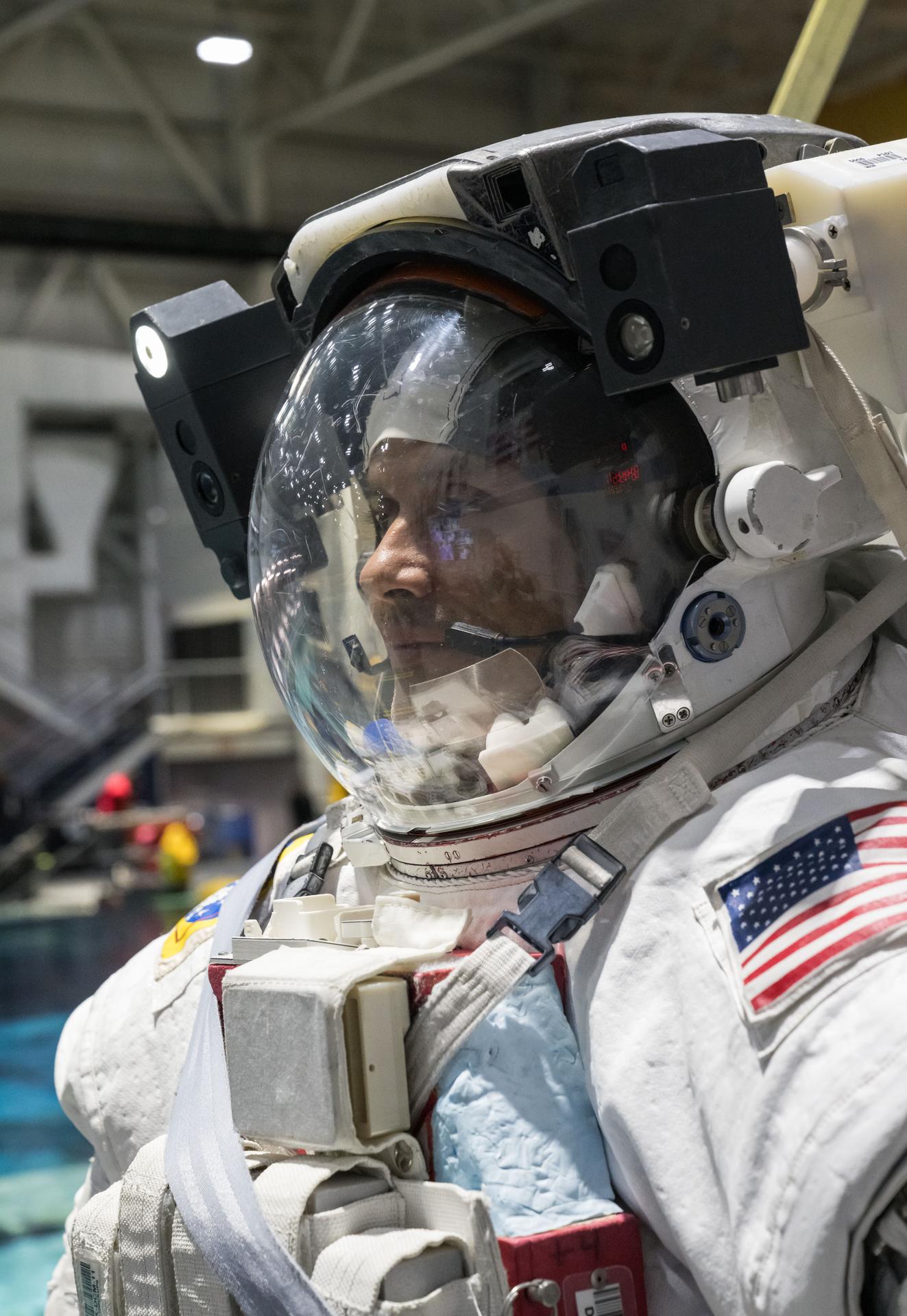 NASA astronaut and Expedition 75 flight engineer Anil Menon participates in a spacewalk training session at Johnson Space Center's Neutral Buoyancy Laboratory in Houston, Texas, ahead of his upcoming mission to the International Space Station.