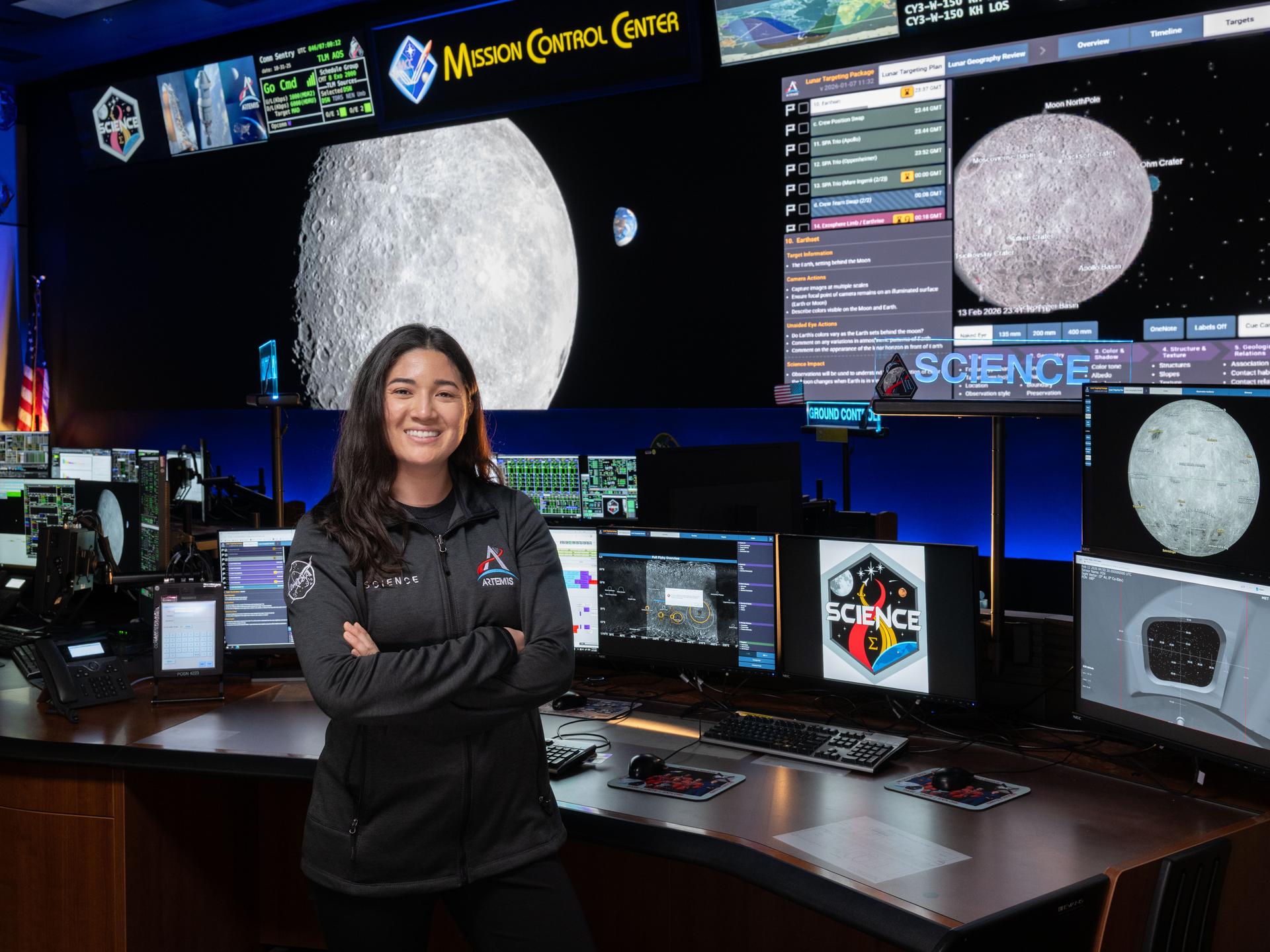 Artemis science officer, Angela Garcia, stands at the new SCIENCE console in the Mission Control Center at NASA’s Johnson Space Center in Houston. Credits: NASA/Josh Valcarcel