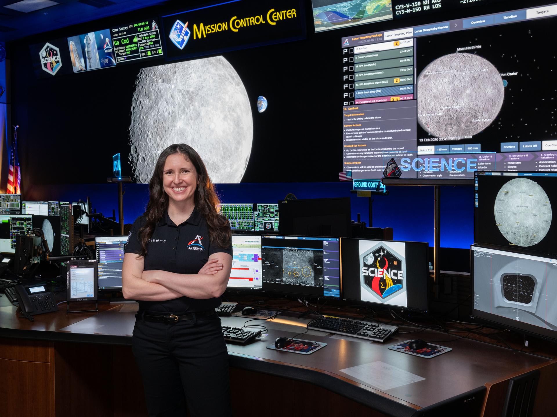 Artemis science officer, Kelsey Young, stands at the new SCIENCE console in the Mission Control Center at NASA’s Johnson Space Center in Houston. Credits: NASA/Josh Valcarcel