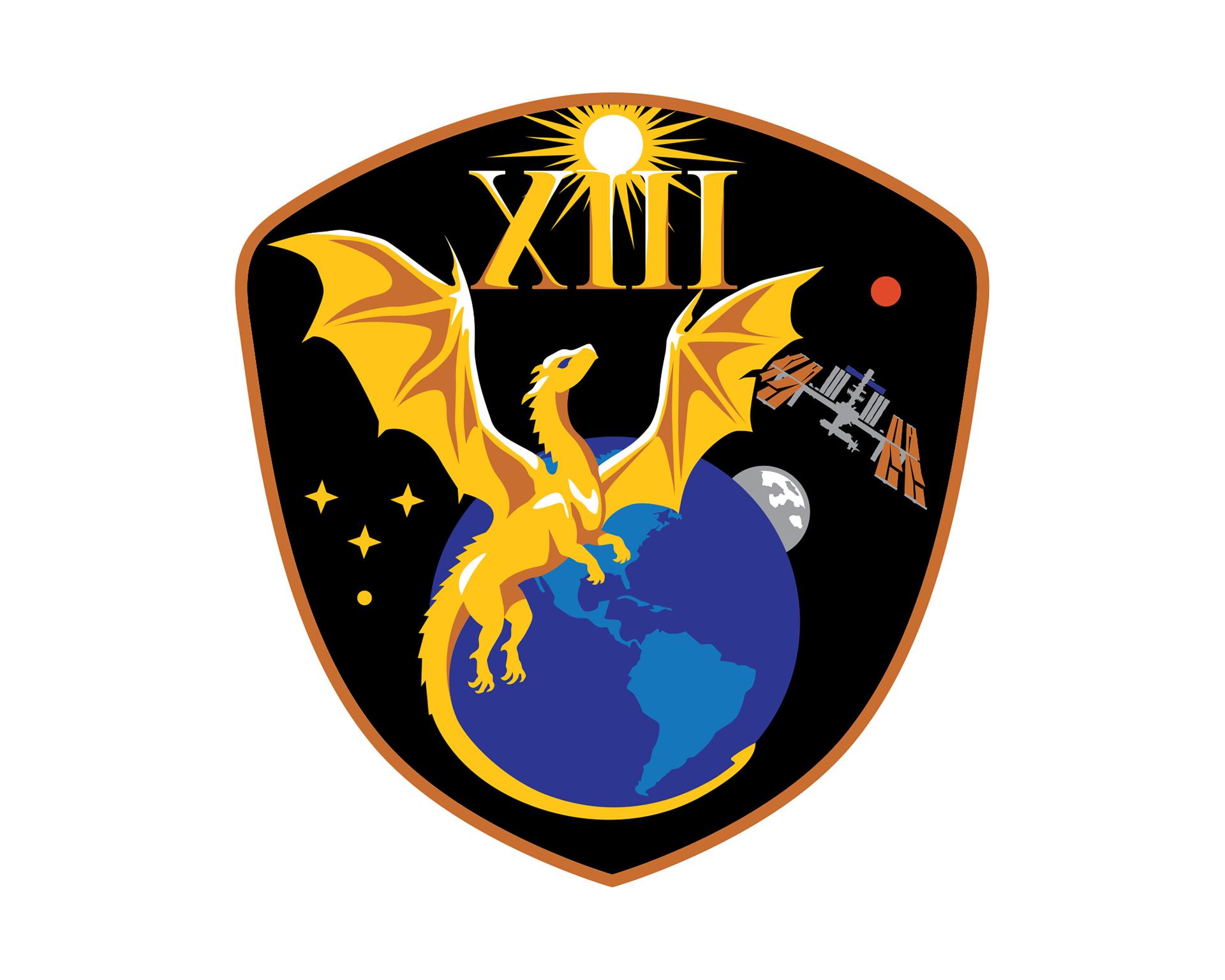 jsc2026e006908 (Feb, 11, 2026) --- NASA’s SpaceX Crew-13 patch looks ardently toward the future of space exploration while honoring the legacy of those who came before. The central golden dragon harkens back to Apollo 13, embodying resilience and gazing upward to the dawn of a new era of discovery. The tail contours around Earth in an embrace, highlighting the interconnected nature of human spaceflight and celebrating the collective efforts of the teams who make it possible. The wings, outstretched to form a bridge between Earth, the International Space Station, the Moon, and Mars, reflect the continuity between low Earth orbit and destinations to come. Gold stars burn brightly, representing the crew’s families and support systems as a tribute to their immense contributions to this endeavor. All of these themes are unified within a distinctive capsule silhouette, symbolizing the limitless possibilities born out of human collaboration toward a common goal. Credit: NASA