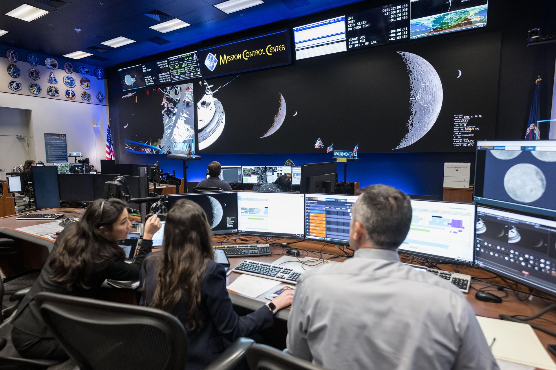 jsc2026e020490 (April 6, 2026) - Pictured from left to right, Angela Garcia, Dr. Kelsey Young, and Dr. Trevor Graff, the...