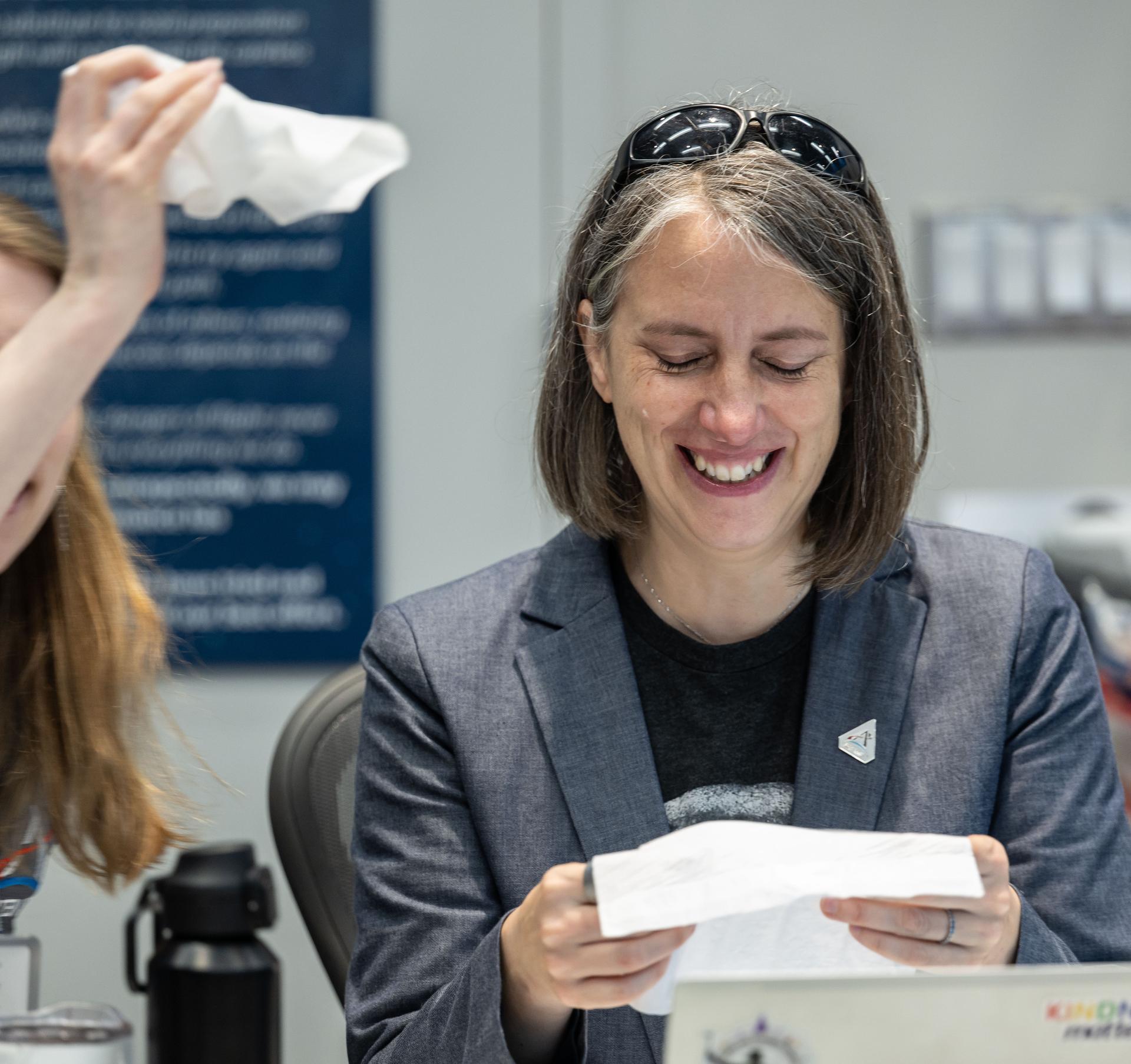 Artemis curation lead, Juliane Gross, reacts to the astronauts' verbal observations of the Moon during their flyby on April 6, 2026. Along with other members of the Artemis II lunar science team, Gross helped train the Artemis II crew in geology both in the classroom and in the field. The team also built the lunar targeting plan that, like an International Space Station spacewalk plan, provides strong, detailed observation guidance, plus flexibility for the crew to make decisions based on what they’re seeing and experiencing in real time. The science team had many moments of celebration during the lunar flyby as the astronauts took images of the Moon and provided verbal descriptions of what they were seeing. This type of information reveals the geologic history of an area and will be critical to collect when future Artemis astronauts explore the Moon's surface. Credits: NASA/Luna Posadas Nava