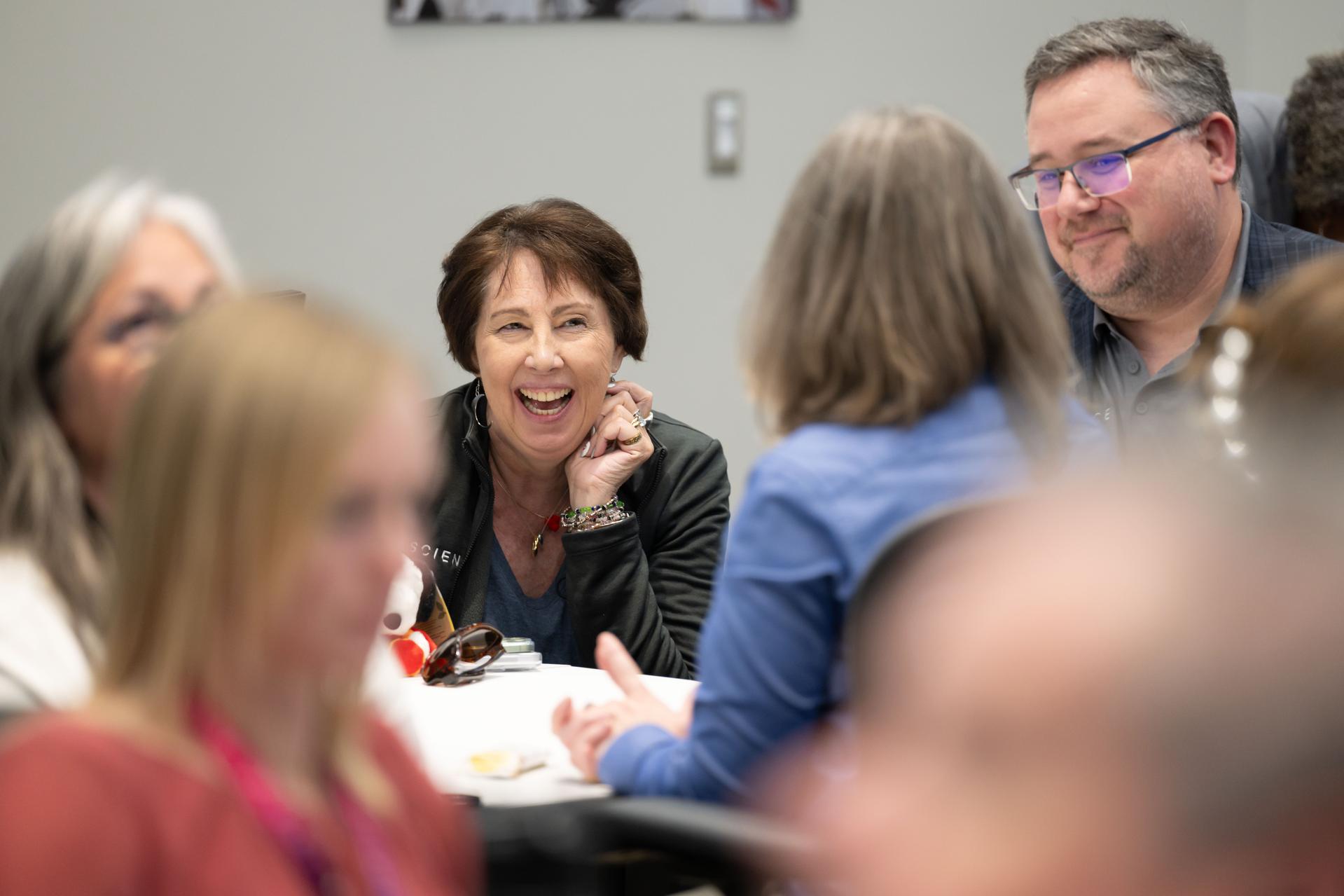 jsc2026e021376 (April 6, 2026) - Nicky Fox, associate administrator for NASA's Science Mission Directorate and Brad Bailey, assistant deputy associate administrator for exploration, observe and celebrate a successful lunar flyby with the Artemis II lunar science team in the Science Evaluation Room in Mission Control at NASA's Johnson Space Center in Houston. Credits: NASA/Luna Posadas Nava