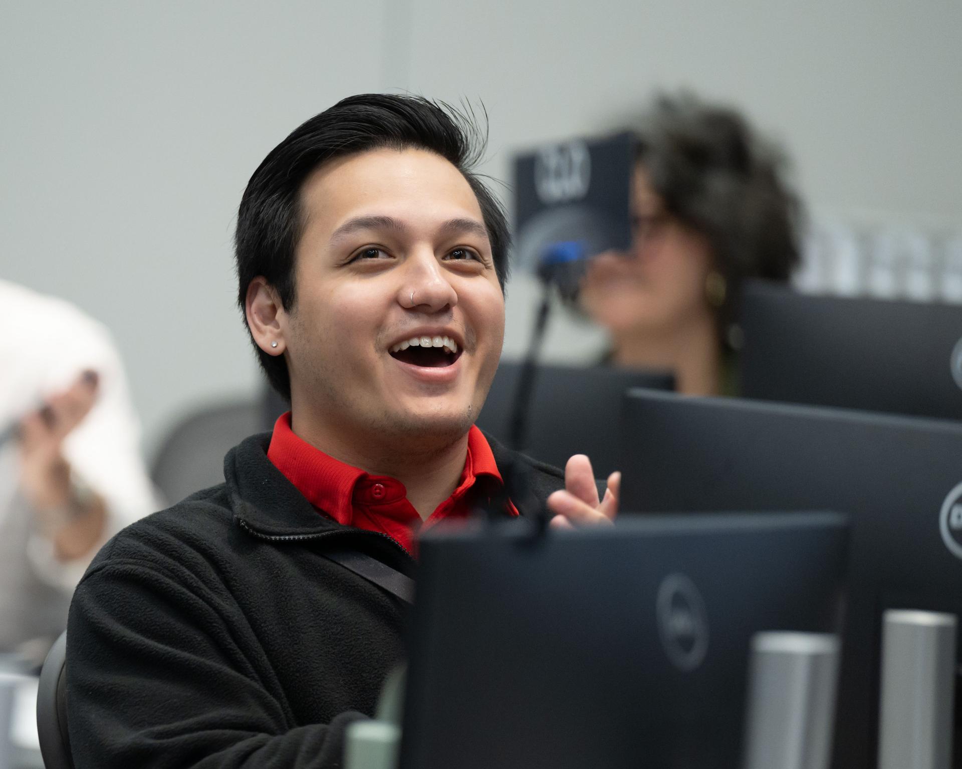 Jared Ralleta, Artemis II lunar science team member, reacts to the lunar flyby crew observations in the Science Evaluation Room (SER). Built specifically for Artemis missions with these science priorities in mind, the SER is equipped to support rapid data interpretation, collaborative analysis, real-time decision making, and seamless coordination between the science and operations teams. Credits: NASA/Luna Posadas Nava