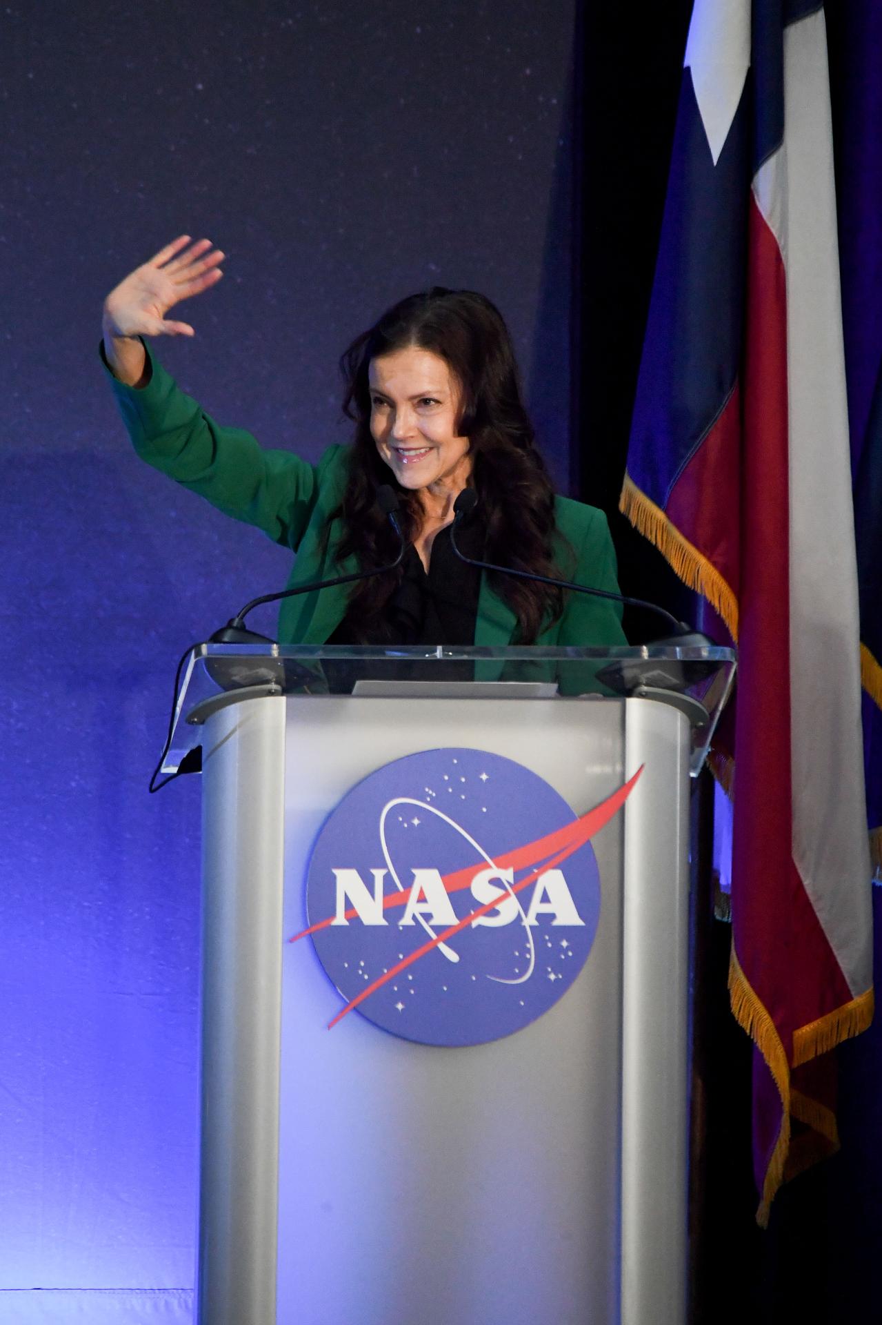 jsc2026e022298 (April 11, 2026) – Canadian Space Agency President Lisa Campbell, addresses a crowd of friends, family, and colleagues assembled for the return of the Artemis II crew at Ellington Airport near NASA’s Johnson Space Center in Houston on Saturday, April 11, 2026. The Artemis II test flight launched on Wednesday, April 1, from NASA’s Kennedy Space Center in Florida to begin its 10-day journey around the Moon for scientific discovery, economic benefits, and to build on our foundation for the first crewed missions to Mars. NASA's Orion spacecraft carrying Artemis II Commander Reid Wiseman, Pilot Victor Glover, and Mission Specialist Christina Koch from NASA, along with Mission Specialist Jeremy Hansen from the CSA (Canadian Space Agency), splashed down in the Pacific Ocean near San Diego, California, on Friday, April 10, 2026. Credit: NASA/Bill Stafford