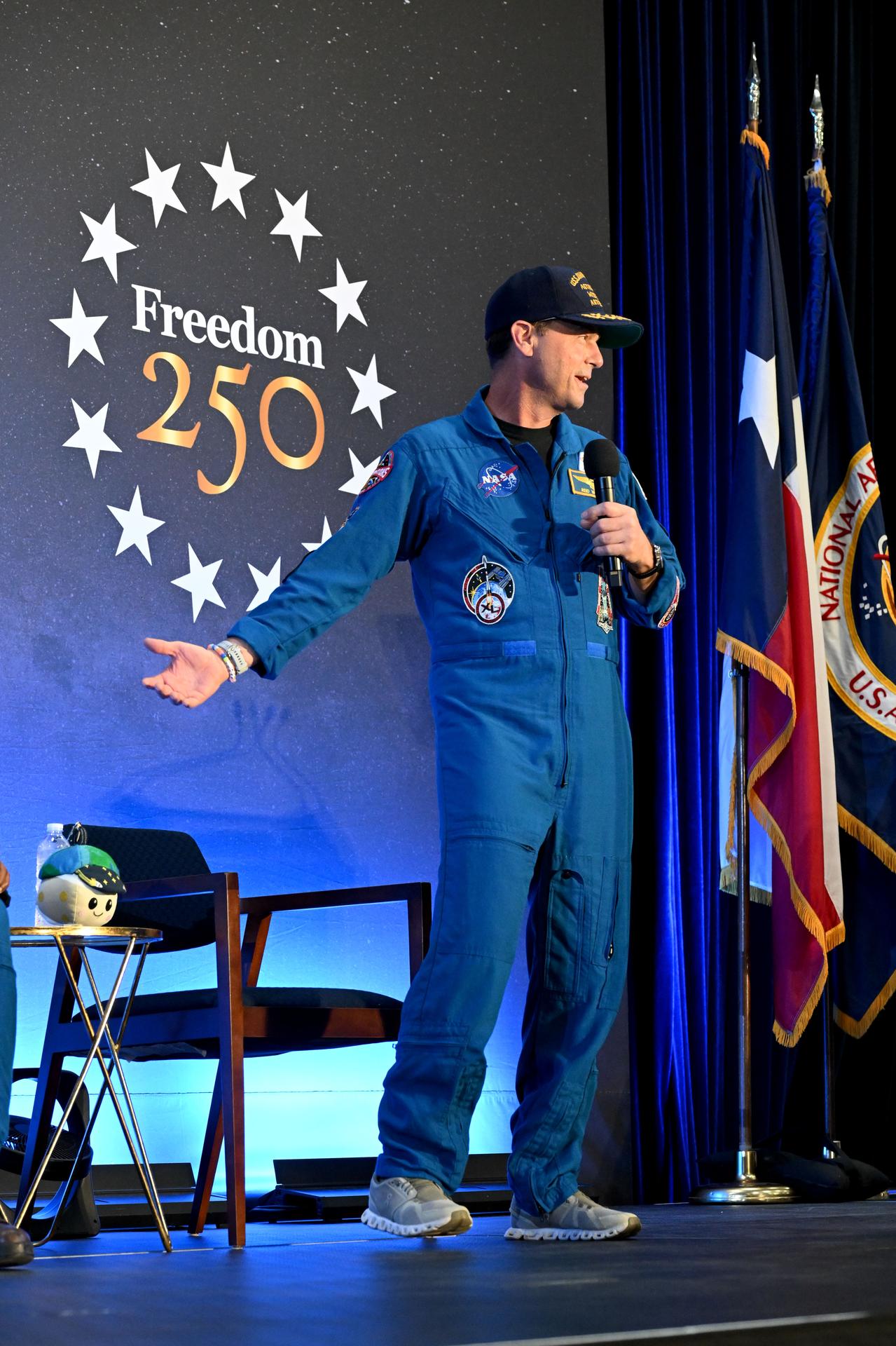 jsc2026e022317 (April 11, 2026) - NASA’s Artemis II crew commander Reid Wiseman shared brief remarks with friends, family, and colleagues after they landed at Ellington Airport near NASA’s Johnson Space Center in Houston on Saturday, April 11, 2026, after a nearly 10-day journey around the Moon and back to Earth. Credit: NASA/Helen Arase Vargas