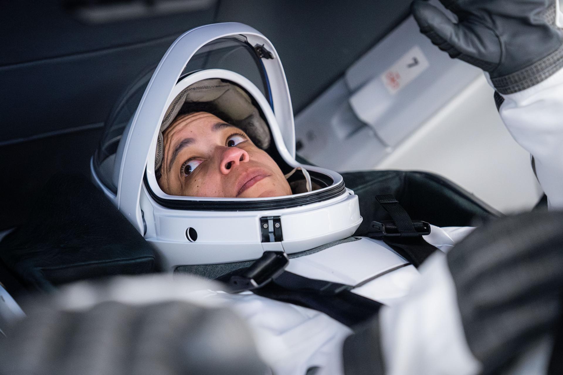 NASA astronaut and SpaceX Crew-13 Commander Jessica Watkins is pictured in her pressure suit and seated inside a SpaceX Dragon spaceraft during a training session at SpaceX headquarters in Hawthorne, California.