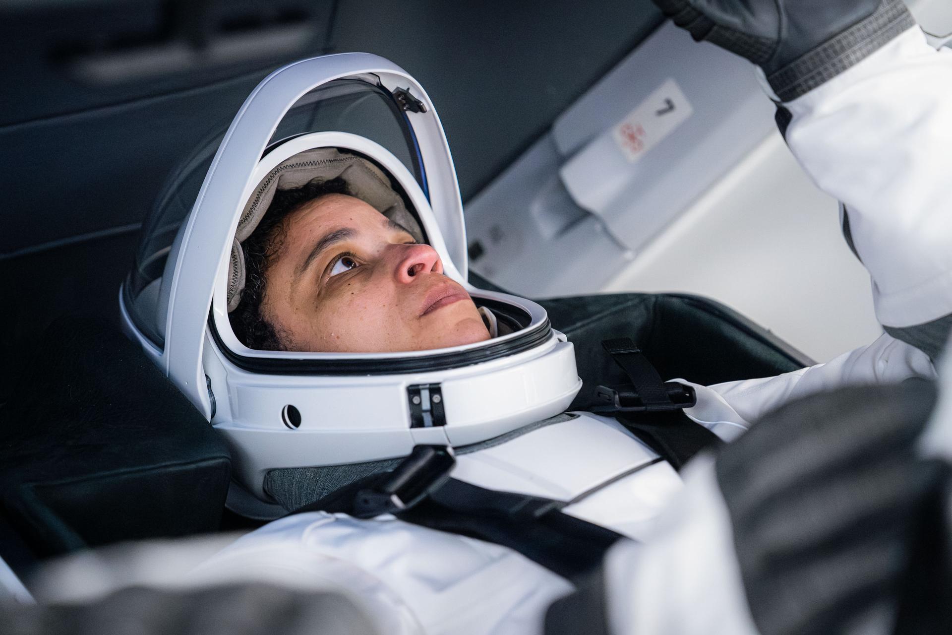 NASA astronaut and SpaceX Crew-13 Commander Jessica Watkins is pictured in her pressure suit and seated inside a SpaceX Dragon spaceraft during a training session at SpaceX headquarters in Hawthorne, California.