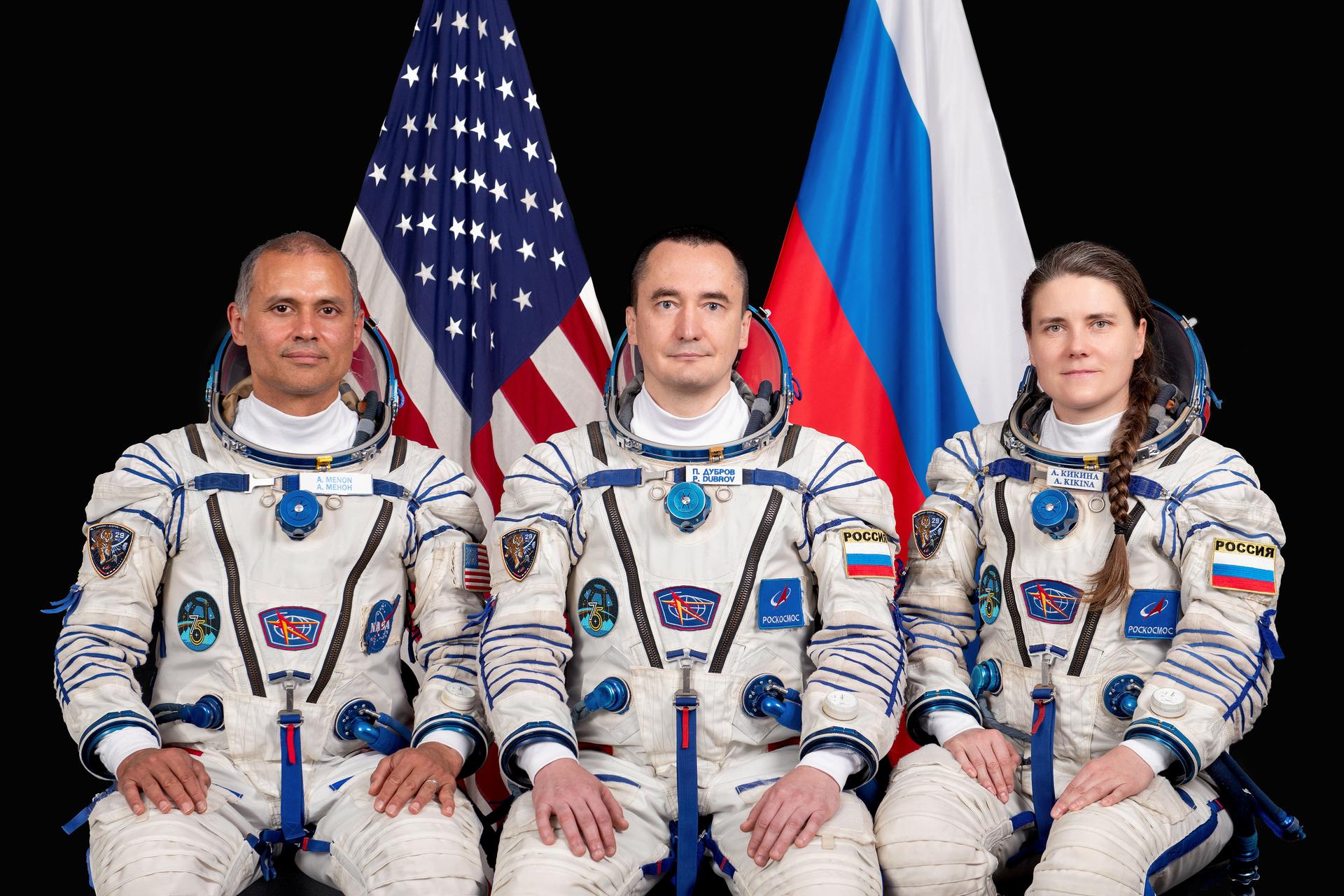 Soyuz MS-29 prime crew members (from left) NASA astronaut Anil Menon and Roscosmos cosmonauts Pyotr Dubrov and Anna Kikina pose for a portrait at the Gagarin Cosmonaut Training Center in Russia.