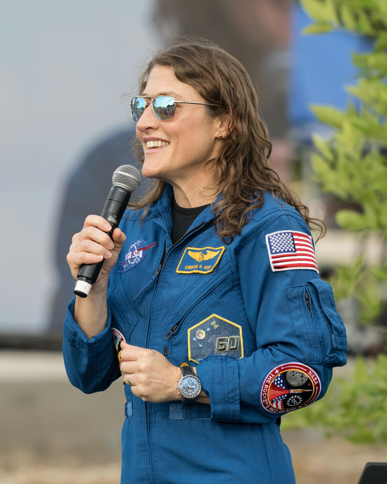 jsc2026e396748 (June 25, 2026) - NASA astronaut Christina Koch addresses the crowd at an Artemis II employee celebration event at NASA's Johnson Space Center. Credit: NASA