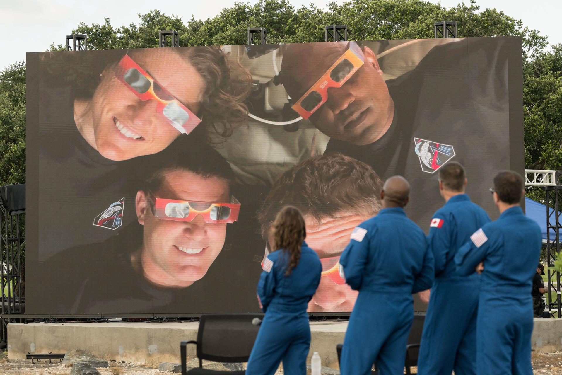 jsc2026e396772 (June 25, 2026) - The Artemis II crew reflects on their historic 10-day journey around the Moon and back to Earth at an Artemis II employee celebration event at the Lunar Receiving Park at NASA's Johnson Space Center. Credit: NASA