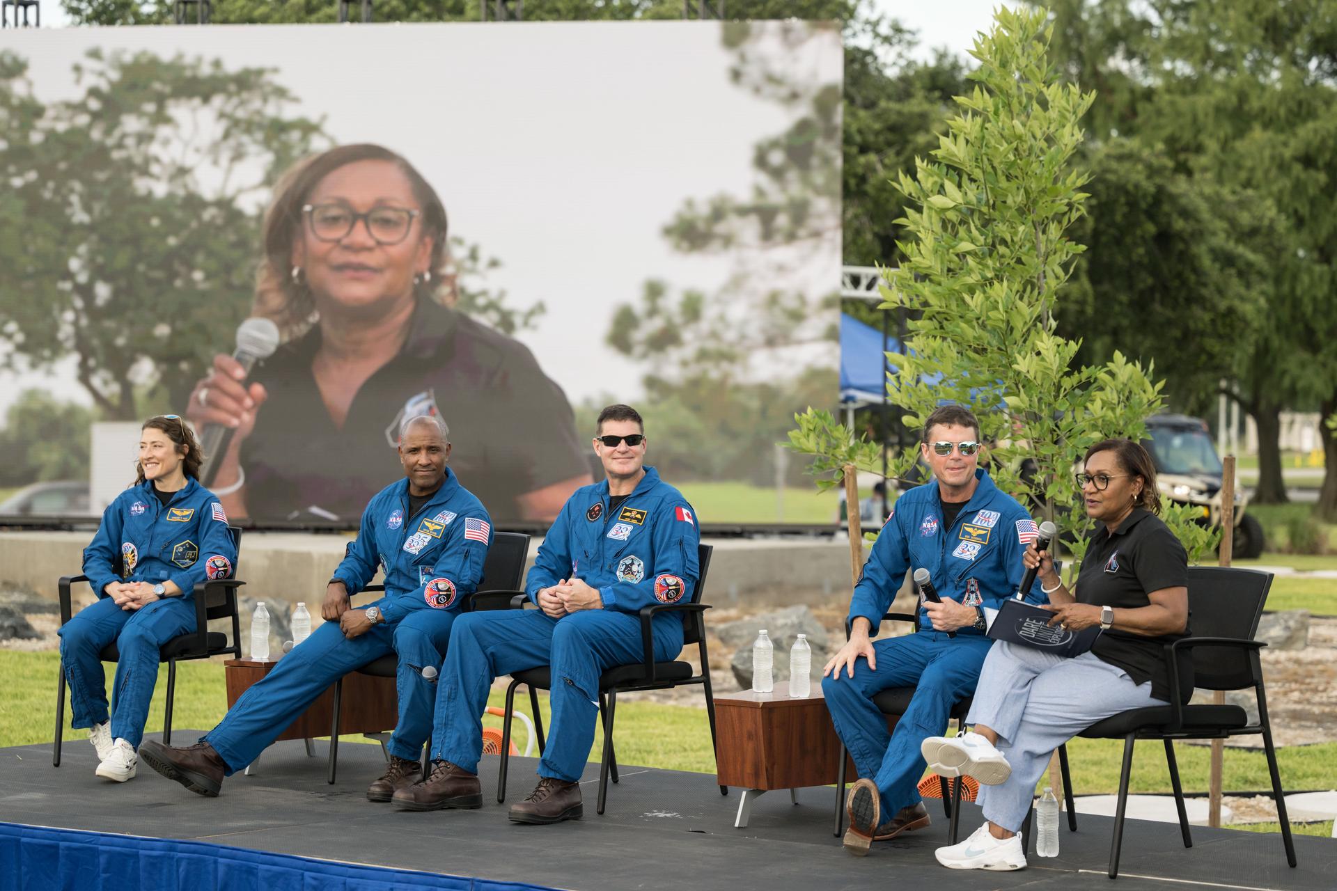 jsc2026e396775 (June 25, 2026) - NASA's Johnson Space Center Director Vanessa Wyche moderates a Q&A with the Artemis II crew as part of an Artemis II employee celebration event at the Lunar Receiving Park at NASA's Johnson Space Center. Credit: NASA