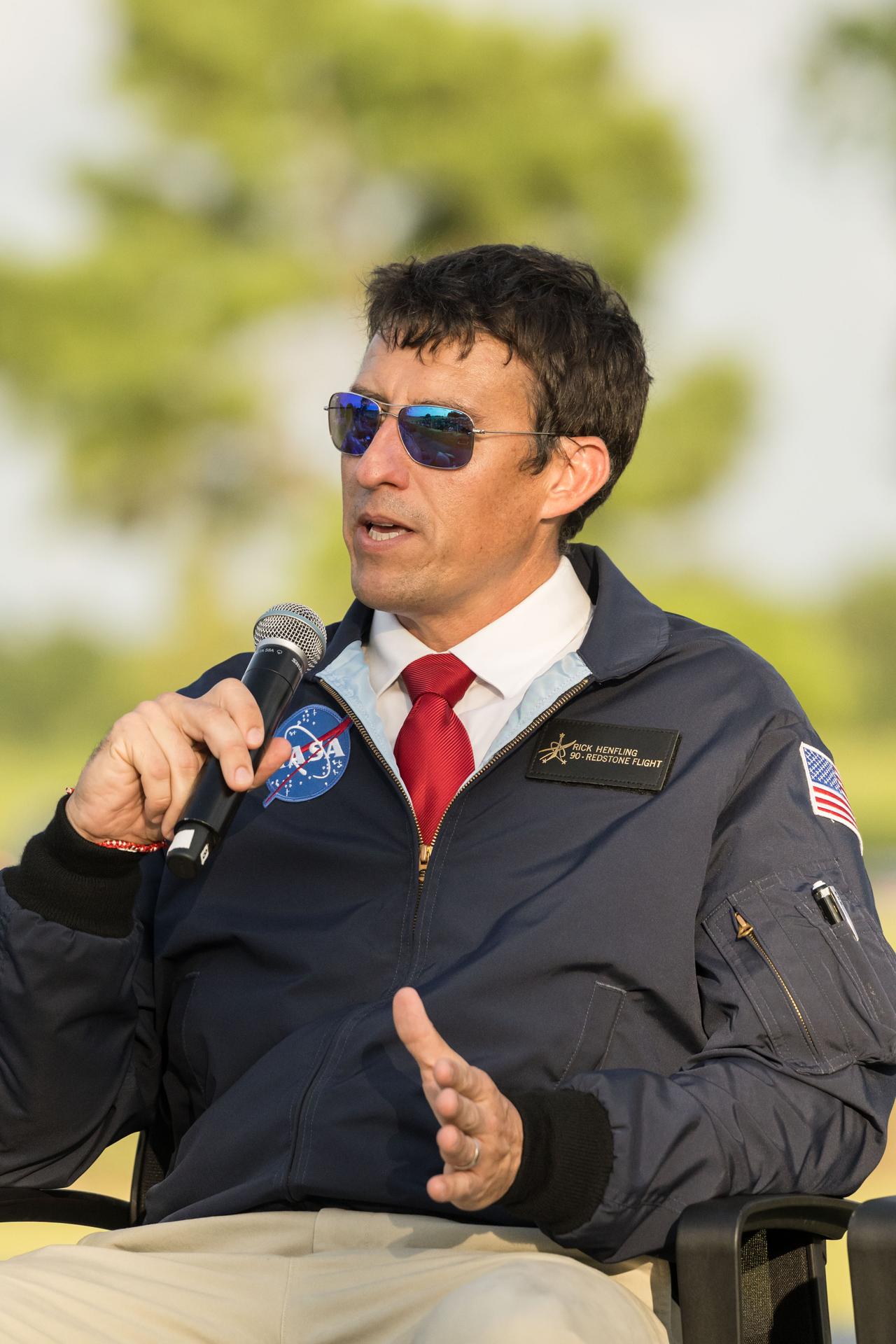 jsc2026e396780 (June 25, 2026) - NASA Flight Director Rick Henfling answers questions from the Artemis II crew during an employee celebration event at NASA's Johnson Space Center. Henfling served as the lead entry flight director during the Artemis II mission. Credit: NASA