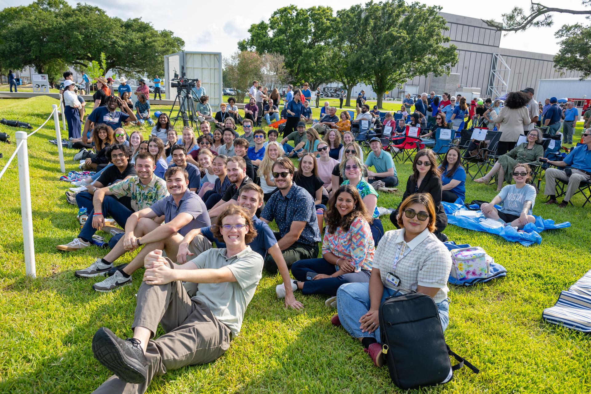 jsc2026e397460 (June 25, 2026) - Attendees celebrate the Artemis II mission at the Lunar Receiving Park at NASA's Johnson Space Center. Credit: NASA
