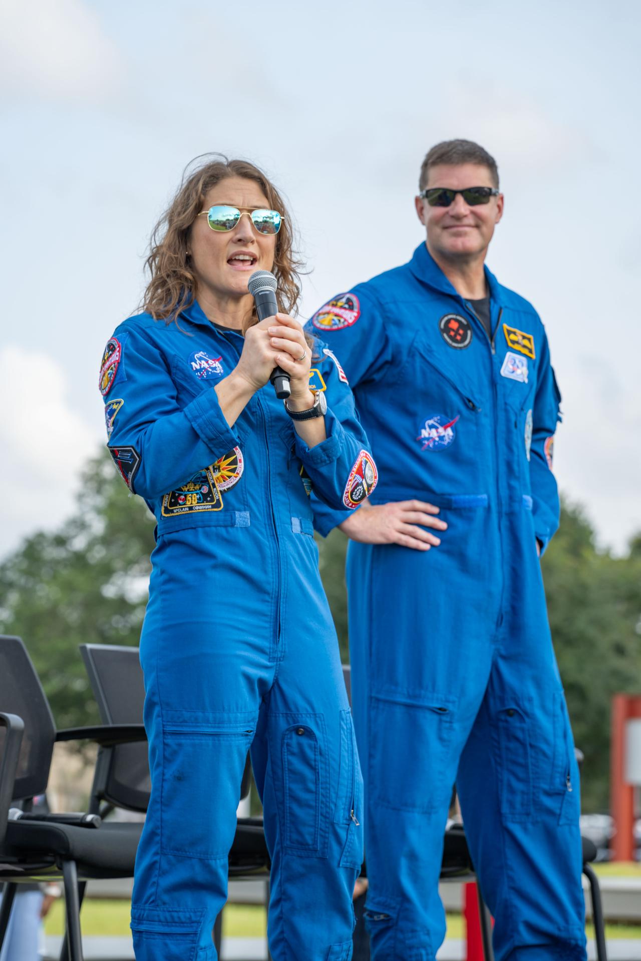 jsc2026e397471 (June 25, 2026) - NASA astronaut Christina Koch addresses the crowd at an Artemis II employee celebration event at NASA's Johnson Space Center. Credit: NASA