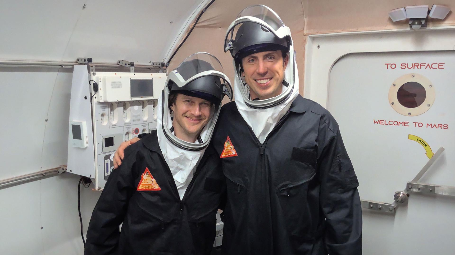 jsc2026e403159 (Oct. 26, 2025) -- Crew Health and Performance Exploration Analog (CHAPEA) mission 2 science officer, Matthew Montgomery, and CHAPEA mission 2 commander, Ross Elder, in the airlock ready to go on an EVA. Credit: NASA