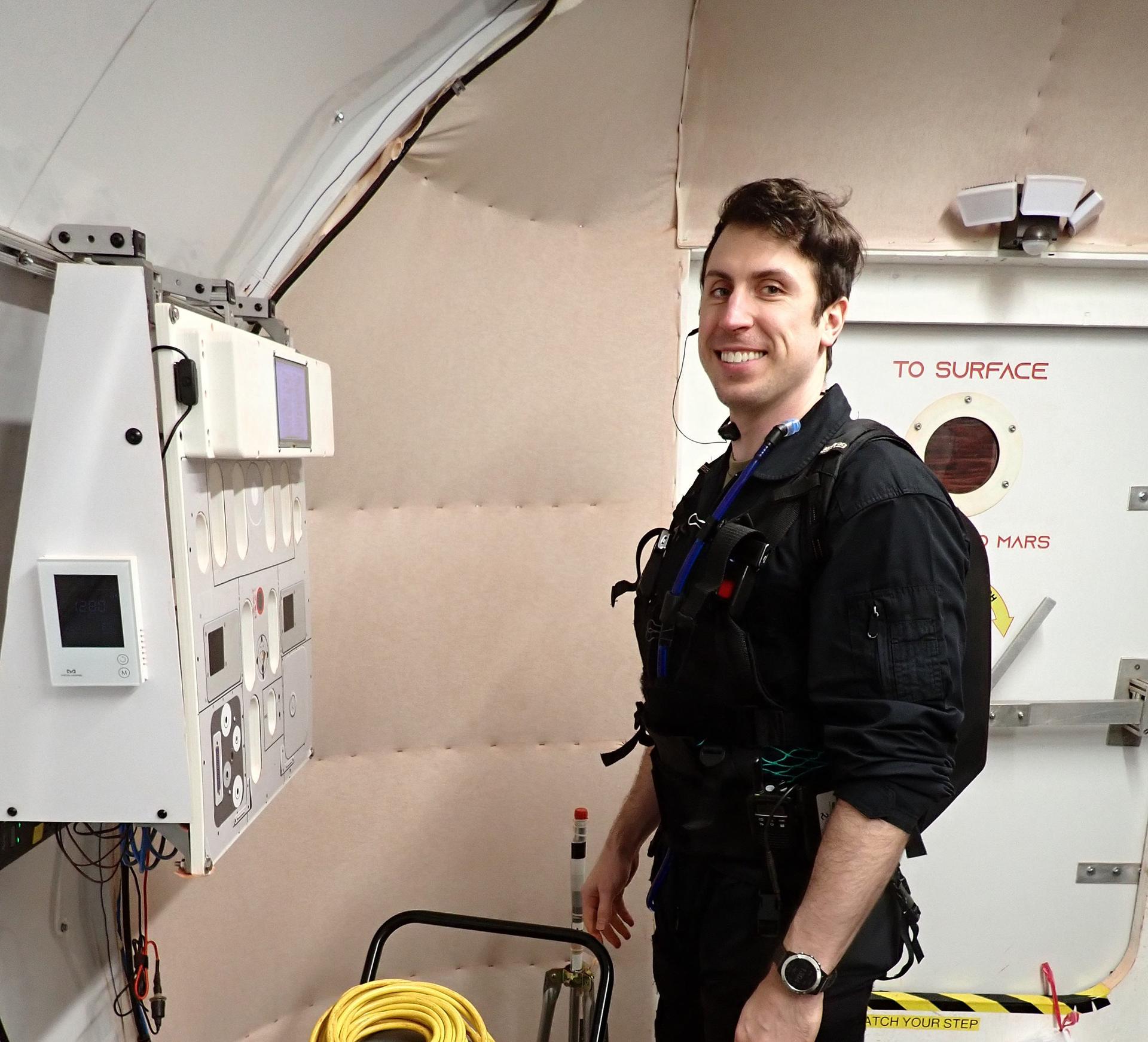 jsc2026e403181 (June 12, 2026) -- Ross Elder, Crew Health and Performance Exploration Analog (CHAPEA) Mission 2 commander, preparing to simulate an airlock depressurization and egress to conduct an EVA. Credit: NASA
