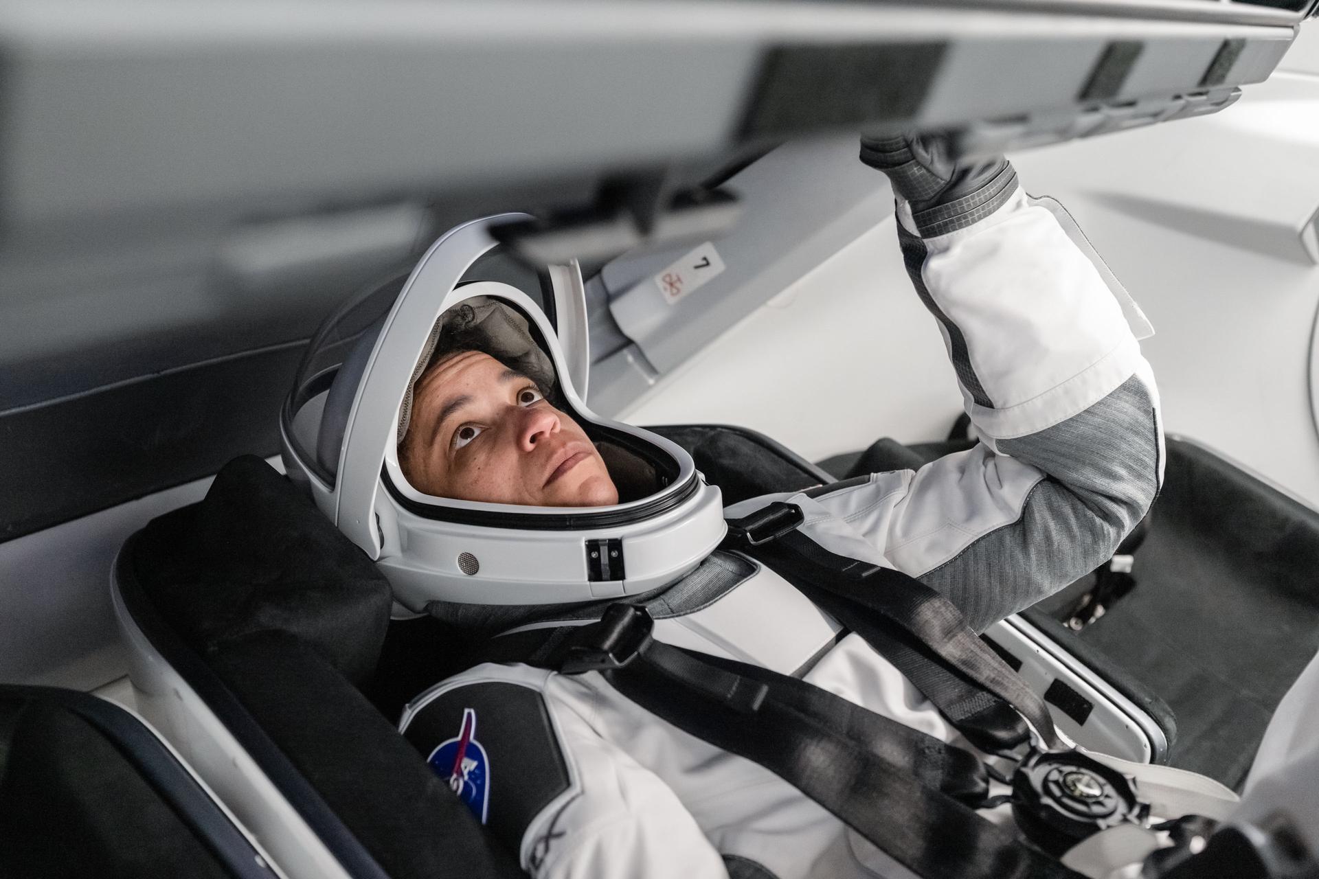 NASA astronaut and SpaceX Crew-13 Commander Jessica Watkins sits inside a Dragon spacecraft mockup while participating in a pre‑flight training session at SpaceX headquarters in Hawthorne, California.