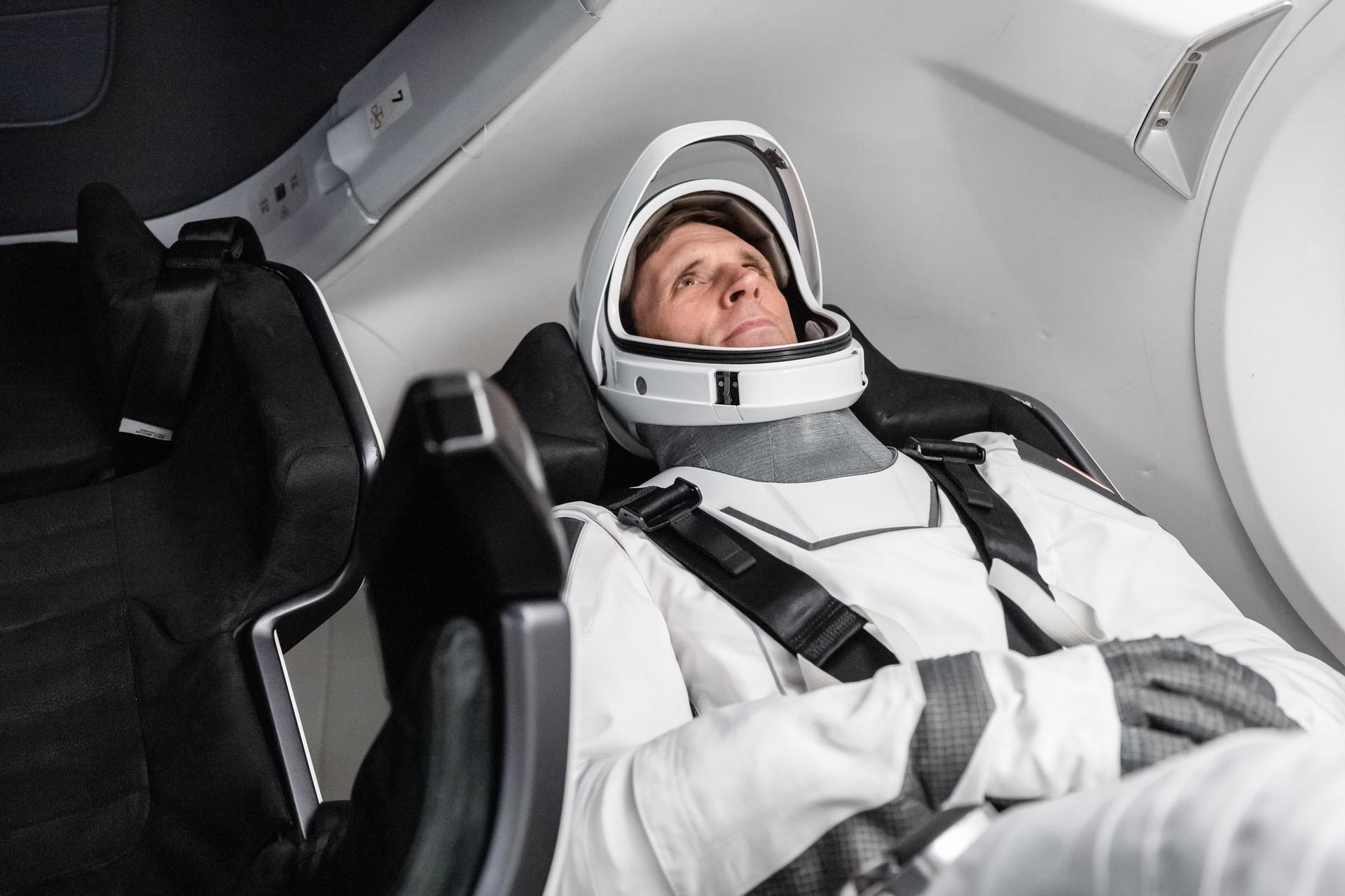 CSA (Canadian Space Agency) astronaut and SpaceX Crew-13 Mission Specialist Joshua Kutryk sits inside a Dragon spacecraft mockup while participating in a pre‑flight training session at SpaceX headquarters in Hawthorne, California.