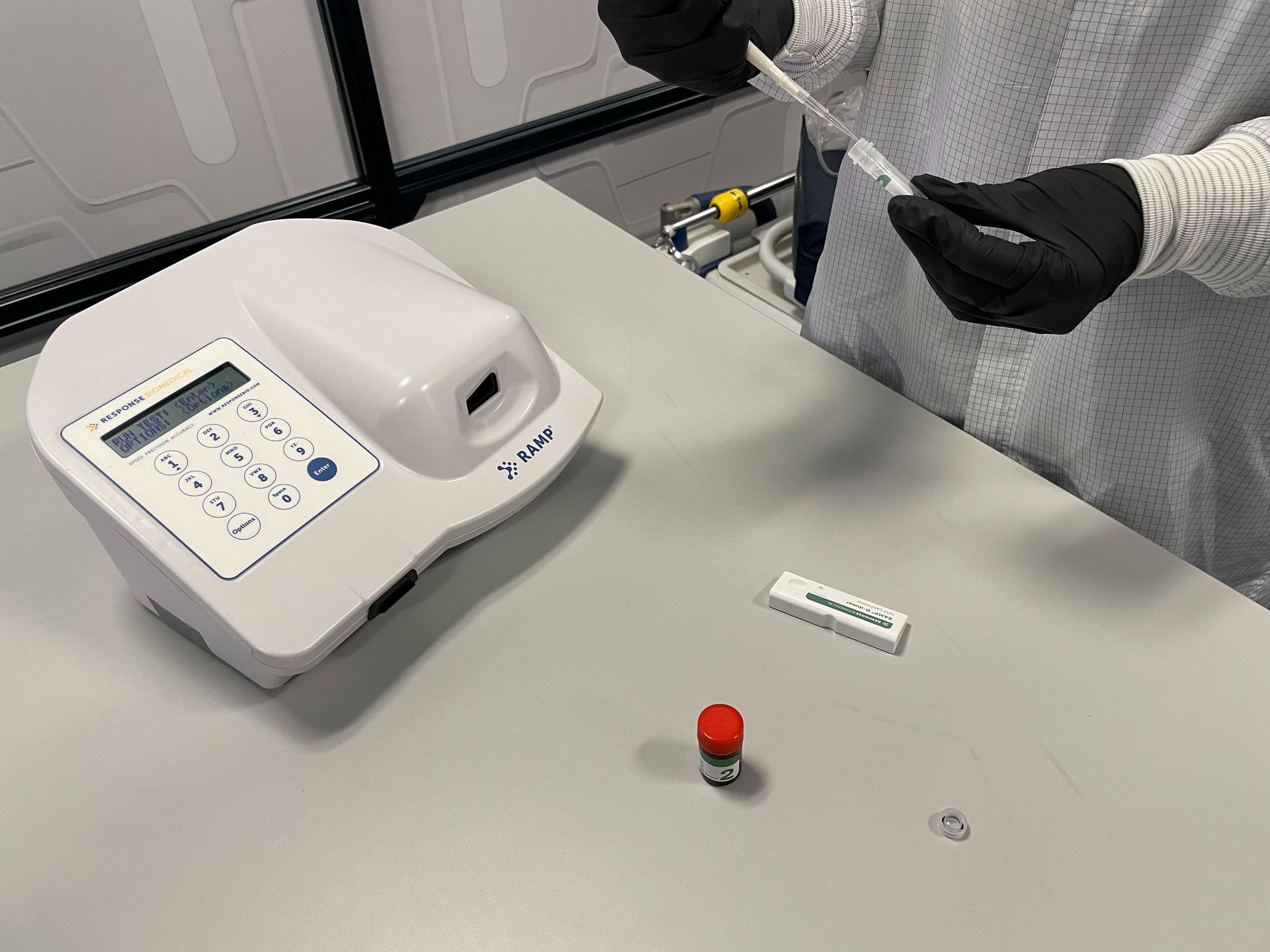 jsc2026e404779 (July 29, 2026) --- Preflight image of an operator preparing a D-dimer cartridge to insert into the Acute Care Testing in Space (ACTIS) Reader. This facility allows different blood tests in space, including measuring D-dimer, a blood marker that can indicate a possible blood clot. Credit: CSA.