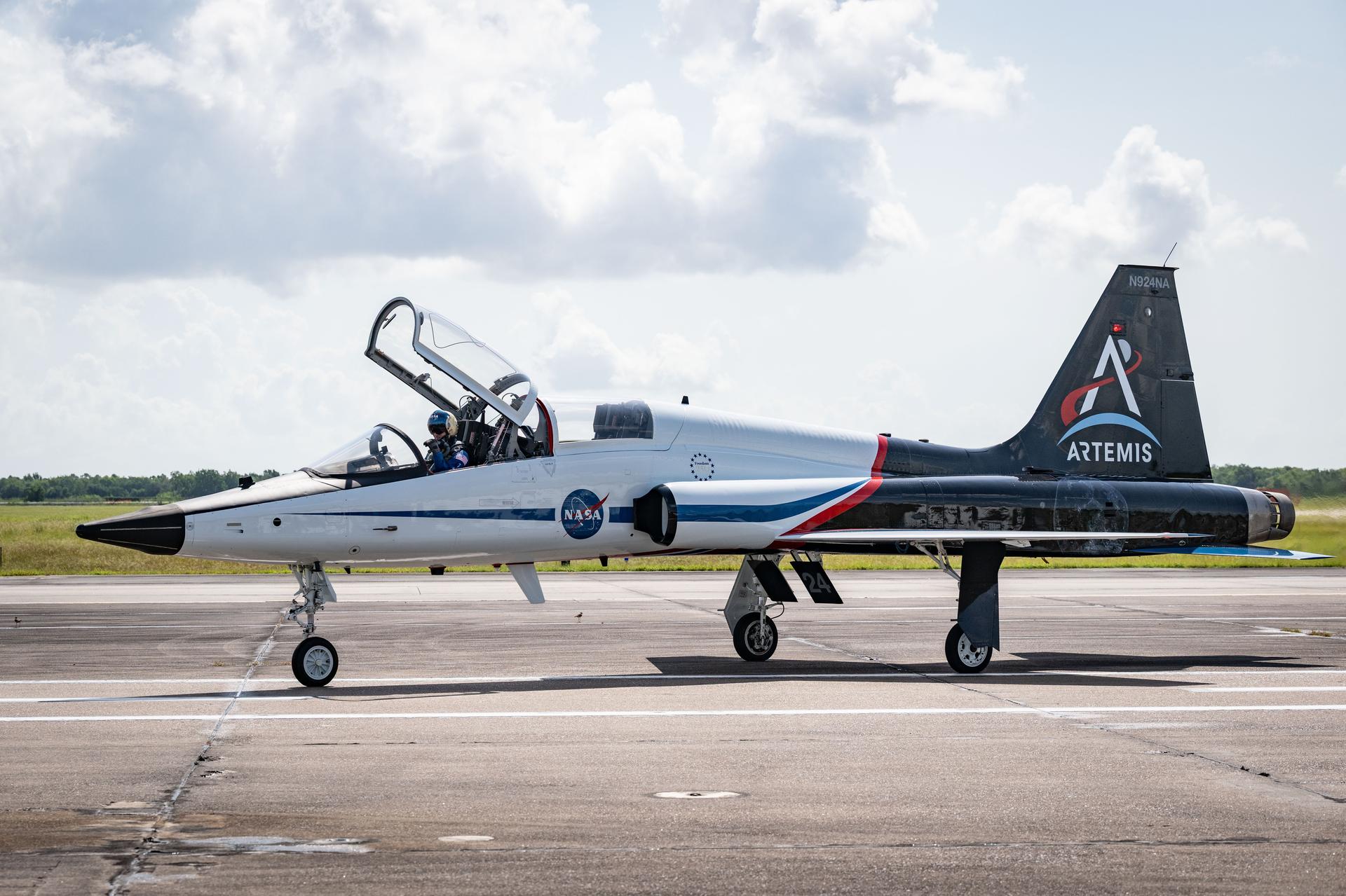 jsc2026e407798 (Aug. 7, 2026) - NASA's T-38 N924NA debuted an updated livery honoring the Artemis Program. Astronauts fly in T-38s to train for making real-time decisions in a high-stakes, operational environment. This helps prepare them for the fast-paced mission moments they’ll experience on future spaceflights to the International Space Station or the Moon and beyond.  Credit: NASA/James Blair