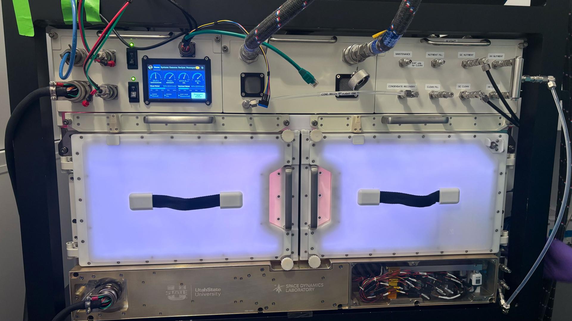 jsc2026e415100 (September 08, 2026) --- Preflight image of Utah State University’s OHALO III module in a closed configuration. This facility aims to validate plant water delivery and volume optimization in the microgravity environment. OHALO III could advance knowledge on crop production and inform design decisions for plant systems on future deep space missions. Credit: NASA KSC.