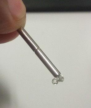 jsc2026e416051 (September 15, 2026) --- A preflight image of a new type of glass being attracted to a magnet, highlighting properties rarely seen in ordinary glass. The ELF‑Unconventional Glass 2 investigation examines how these unusual glasses form and behave in microgravity. Investigation results could reveal new ways of making glasses with unique properties and spark innovations for future technologies. Credit: Kyoto University/Atsunobo Masuno.