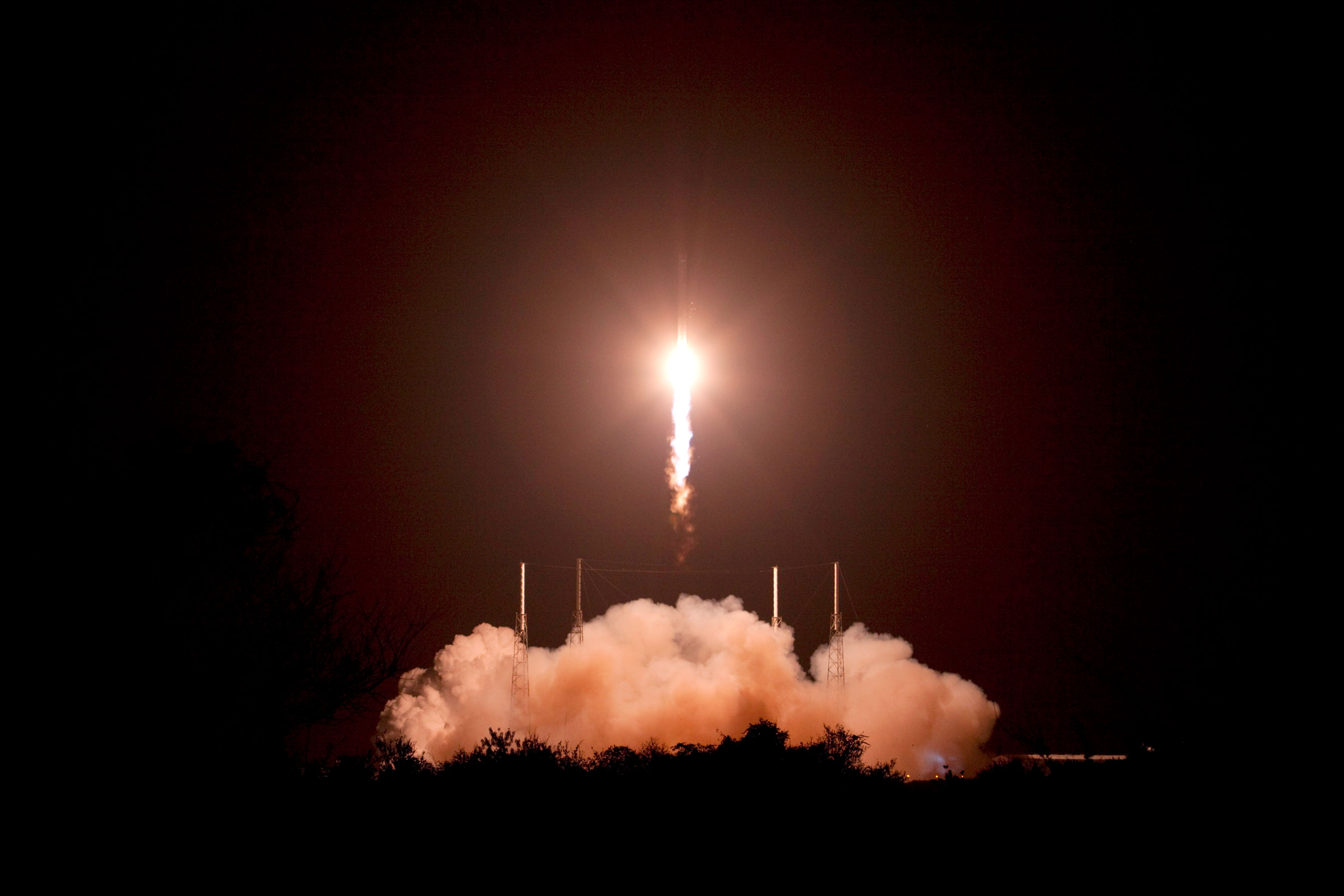CAPE CANAVERAL, Fla. -- A Falcon 9 rocket makes its way into the night sky over Space Launch Complex 40 on Cape Canaveral Air Force Station in Florida carrying a Dragon capsule to orbit. Launch was at 8:35 p.m. EDT. Space Exploration Technologies Corp., or SpaceX, built both the rocket and capsule for NASA's first Commercial Resupply Services, or CRS-1, mission to the International Space Station. SpaceX CRS-1 is an important step toward making America’s microgravity research program self-sufficient by providing a way to deliver and return significant amounts of cargo, including science experiments, to and from the orbiting laboratory. NASA has contracted for 12 commercial resupply flights from SpaceX and eight from the Orbital Sciences Corp. For more information, visit http://www.nasa.gov/mission_pages/station/living/launch/index.html. Photo credit: NASA/Jim Grossmann