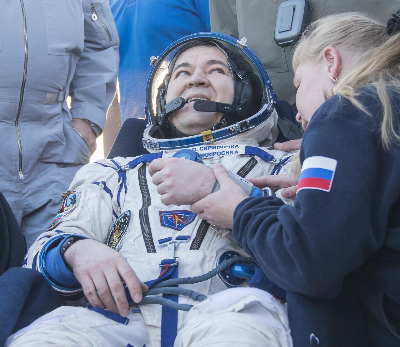 Russian cosmonaut Oleg Skripochka of Roscosmos rest in a chair outside the Soyuz TMA-20M spacecraft a few moments after he and NASA astronaut Jeff Williams, and Russian cosmonaut Alexey Ovchinin of Roscosmos landed in a remote area near the town of Zhezkazgan, Kazakhstan on Wednesday, Sept. 7, 2016(Kazakh time). Williams, Ovchinin, and Skripochka are returning after 172 days in space where they served as members of the Expedition 47 and 48 crews onboard the International Space Station. Photo Credit: (NASA/Bill Ingalls)