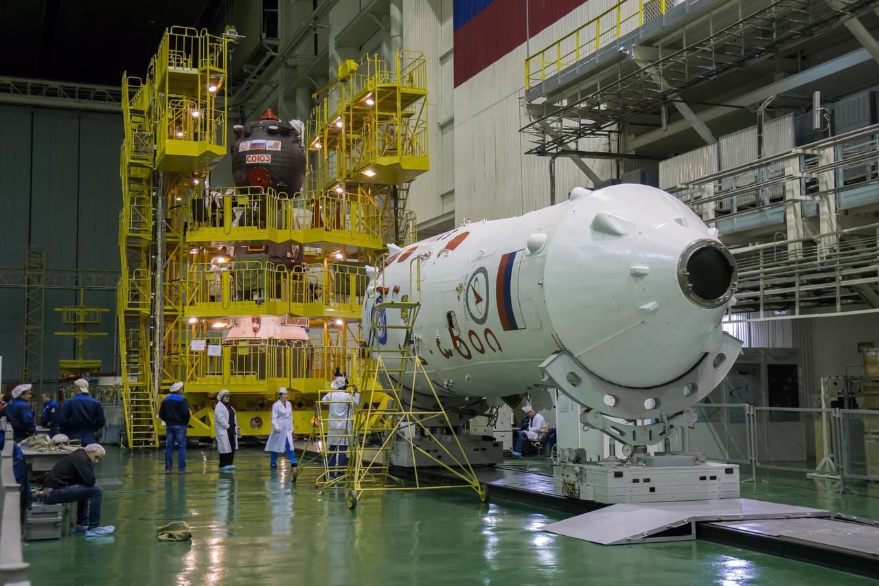 The Soyuz MS-02 spacecraft is seen as the work platforms around it are retracted in preparation for being encapsulated in its fairing on Thursday, Tuesday, Oct. 11, 2016 at the Baikonur Cosmodrome in Kazakhstan. Expedition 49 flight engineer Shane Kimbrough of NASA, flight engineer Andrey Borisenko of Roscosmos, and Soyuz commander Sergey Ryzhikov of Roscosmos are scheduled to launch from the Baikonur Cosmodrome in Kazakhstan on Oct. 19. Photo Credit: (NASA/Victor Zelentsov)