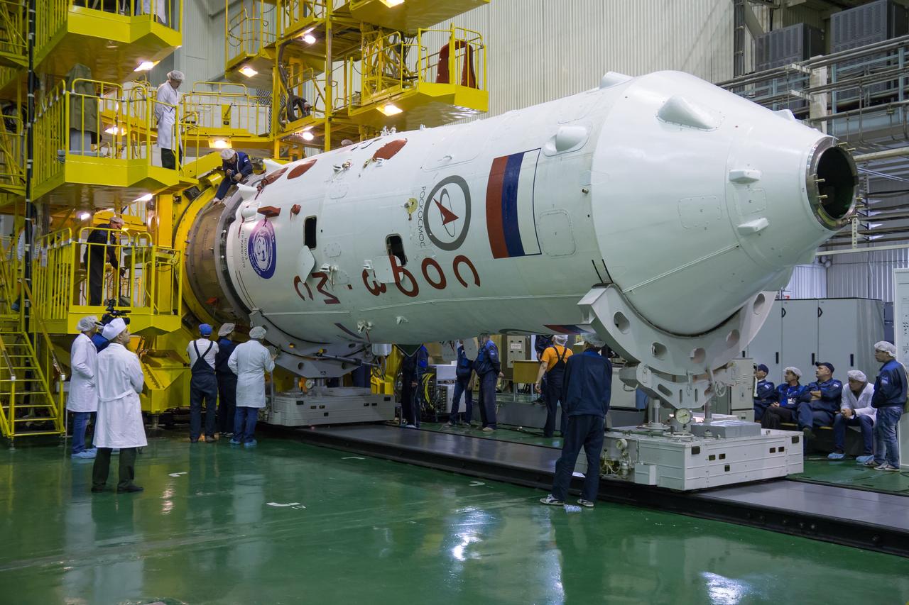 The Soyuz MS-02 spacecraft is seen while being encapsulated in its fairing on Thursday, Tuesday, Oct. 11, 2016 at the Baikonur Cosmodrome in Kazakhstan. Expedition 49 flight engineer Shane Kimbrough of NASA, flight engineer Andrey Borisenko of Roscosmos, and Soyuz commander Sergey Ryzhikov of Roscosmos are scheduled to launch from the Baikonur Cosmodrome in Kazakhstan on Oct. 19. Photo Credit: (NASA/Victor Zelentsov)