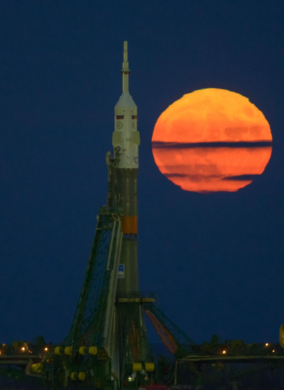 nhq201611140001 (Nov. 14, 2018) --- The Moon, or supermoon, is seen rising behind the Soyuz rocket at the Baikonur Cosmodrome launch pad in Kazakhstan, Monday, Nov. 14, 2016. NASA astronaut Peggy Whitson, Russian cosmonaut Oleg Novitskiy of Roscosmos, and ESA astronaut Thomas Pesquet will launch from the Baikonur Cosmodrome in Kazakhstan the morning of November 18 (Kazakh time.) All three will spend approximately six months on the orbital complex. A supermoon occurs when the moon’s orbit is closest (perigee) to Earth. Photo Credit: (NASA/Bill Ingalls)