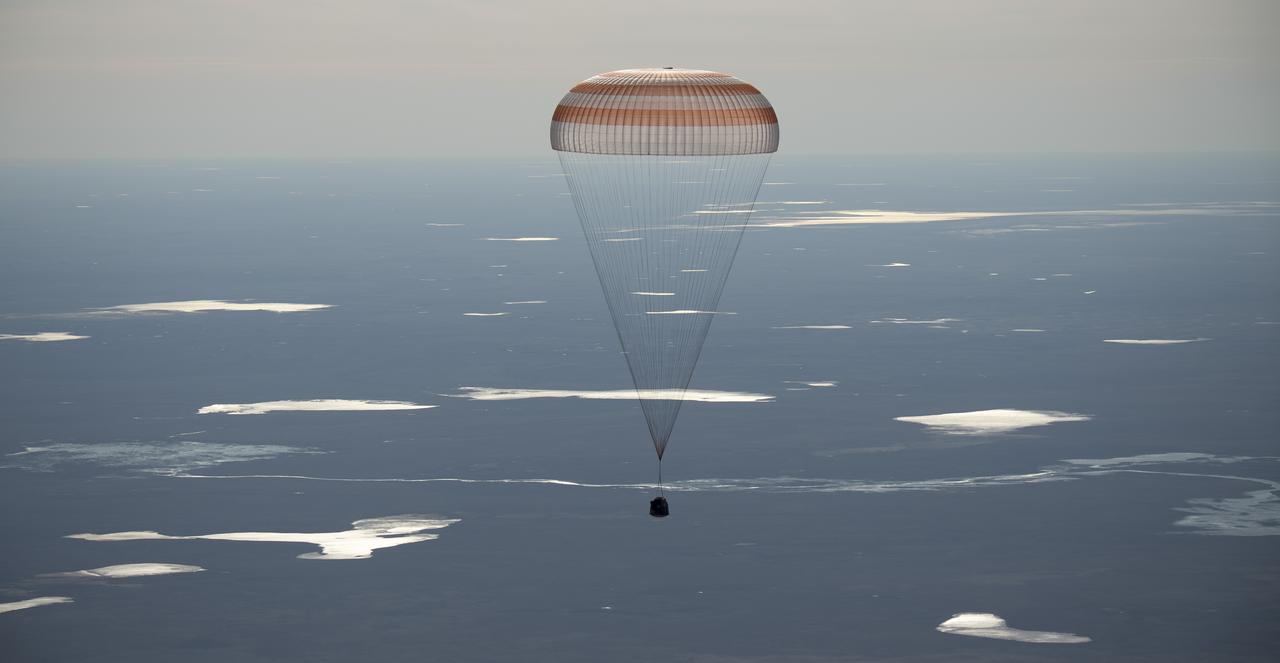 nhq201704100009 (April 10, 2017) --- The Soyuz MS-02 spacecraft is seen as it lands with Expedition 50 Commander Shane Kimbrough of NASA and Flight Engineers Sergey Ryzhikov and Andrey Borisenko of Roscosmos near the town of Zhezkazgan, Kazakhstan on Monday, April 10, 2017 (Kazakh time). Kimbrough, Ryzhikov, and Borisenko are returning after 173 days in space where they served as members of the Expedition 49 and 50 crews onboard the International Space Station. Photo Credit: (NASA/Bill Ingalls)