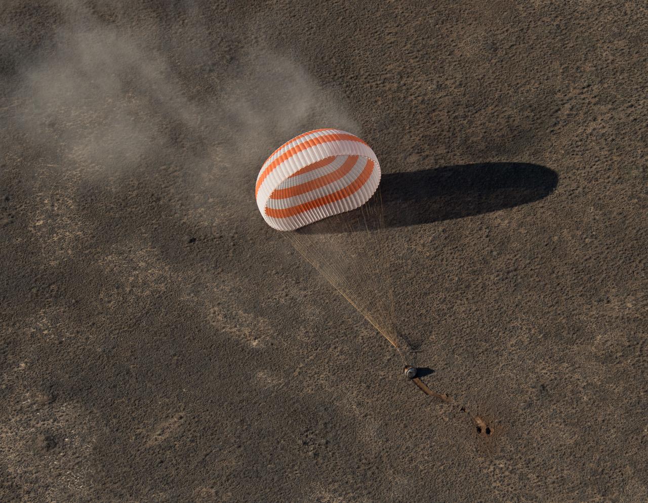 nhq201704100019 (April 10, 2017) --- The Soyuz MS-02 spacecraft is seen as it lands with Expedition 50 Commander Shane Kimbrough of NASA and Flight Engineers Sergey Ryzhikov and Andrey Borisenko of Roscosmos near the town of Zhezkazgan, Kazakhstan on Monday, April 10, 2017 (Kazakh time). Kimbrough, Ryzhikov, and Borisenko are returning after 173 days in space where they served as members of the Expedition 49 and 50 crews onboard the International Space Station. Photo Credit: (NASA/Bill Ingalls)